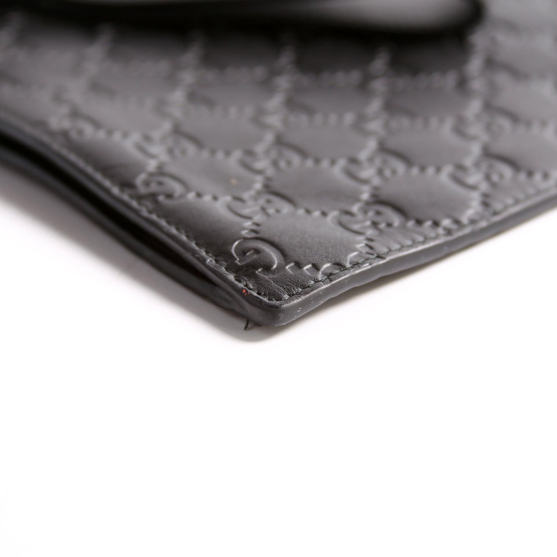 473963 Guccissima Zip Clutch Black