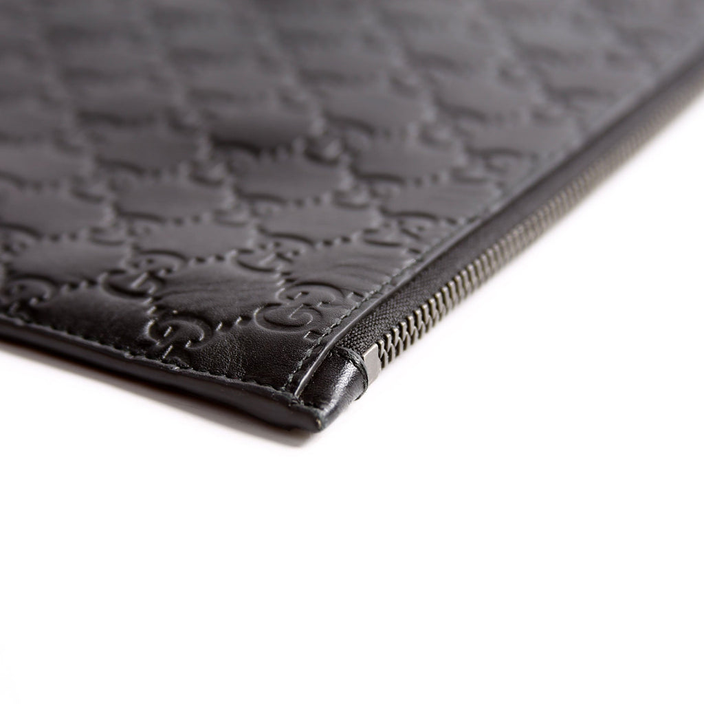 473963 Guccissima Zip Clutch Black