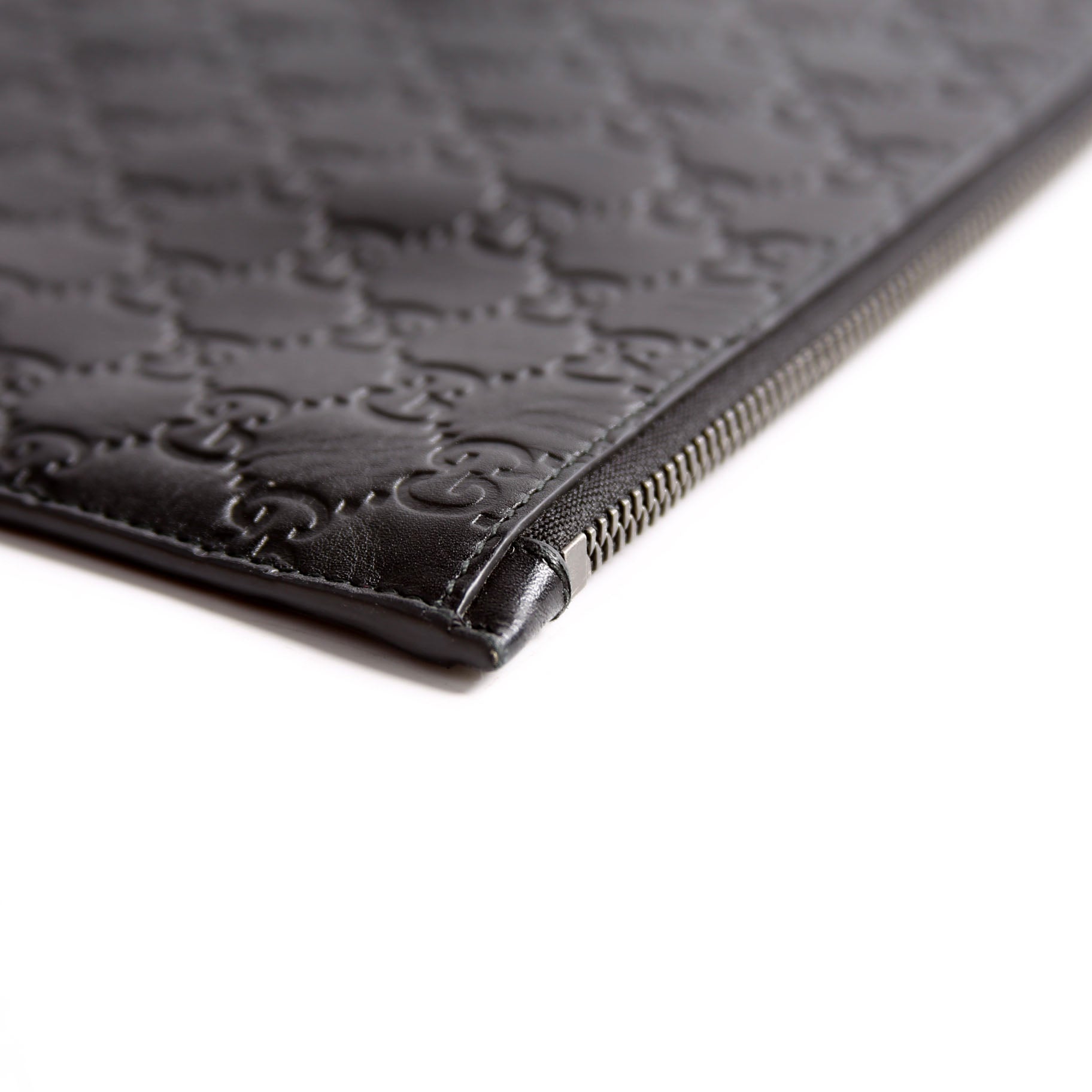 473963 Guccissima Zip Clutch Black