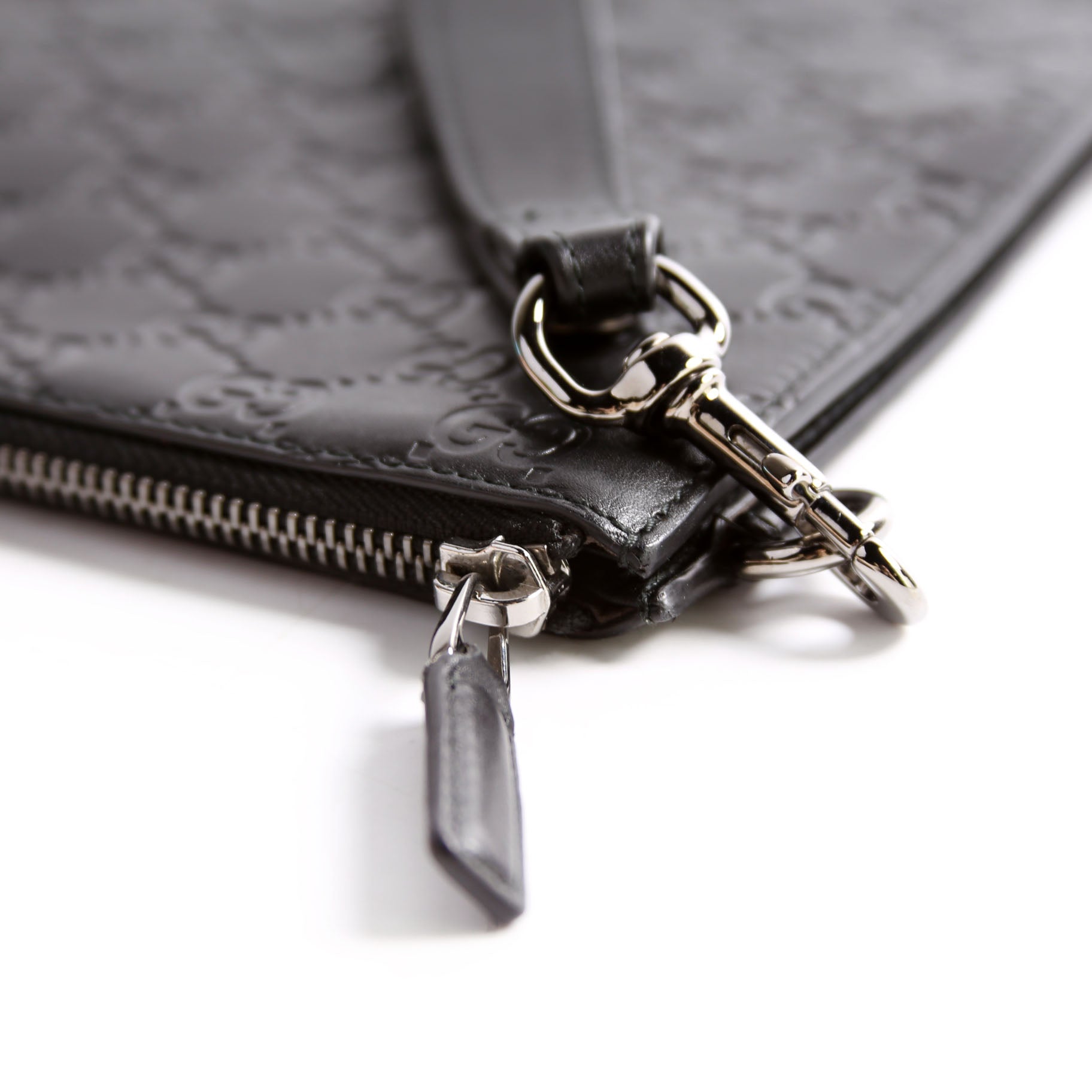 473963 Guccissima Zip Clutch Black