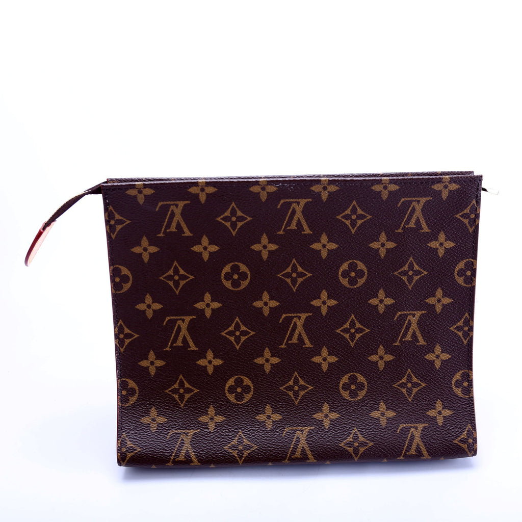 Pochette Toilette NM Monogram