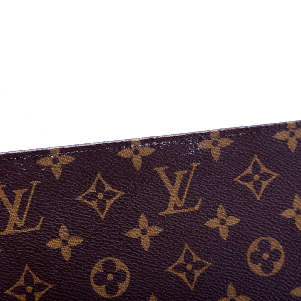 Pochette Toilette NM Monogram