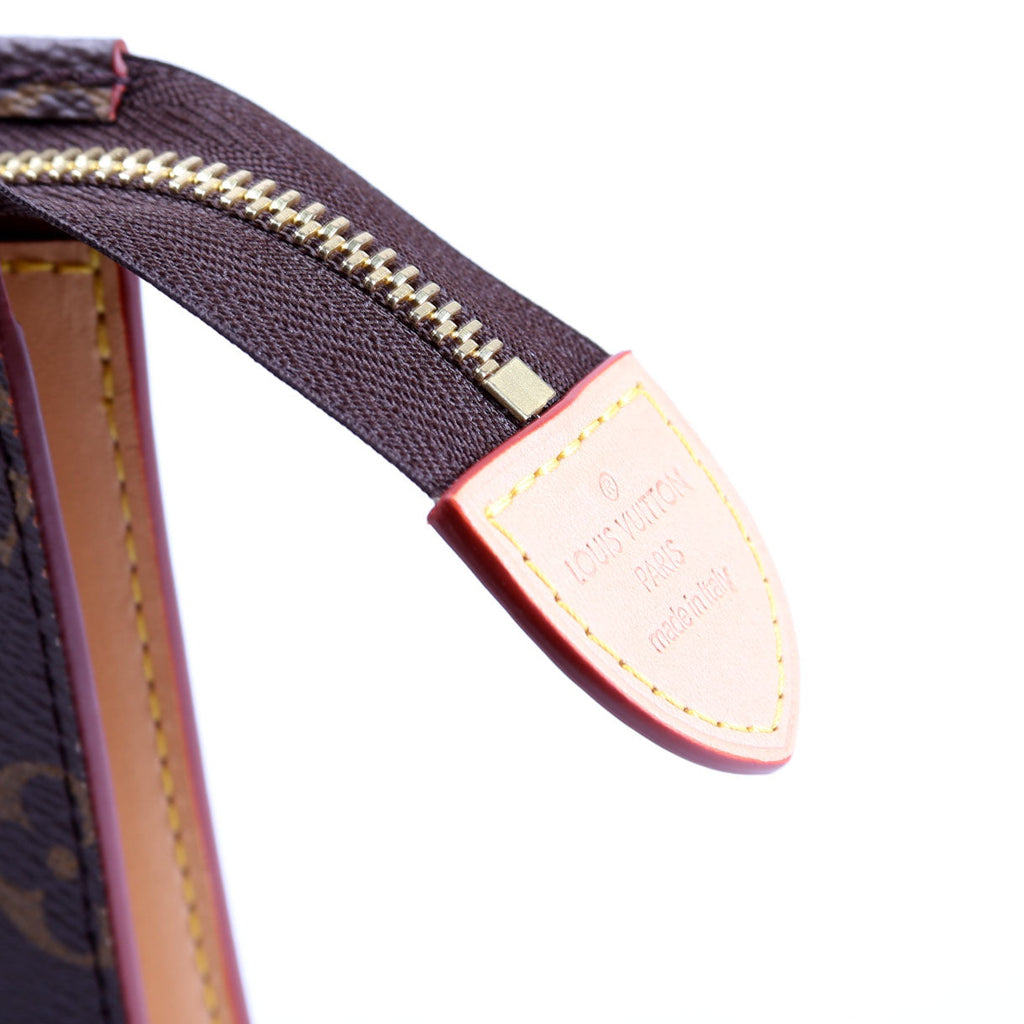 Pochette Toilette NM Monogram