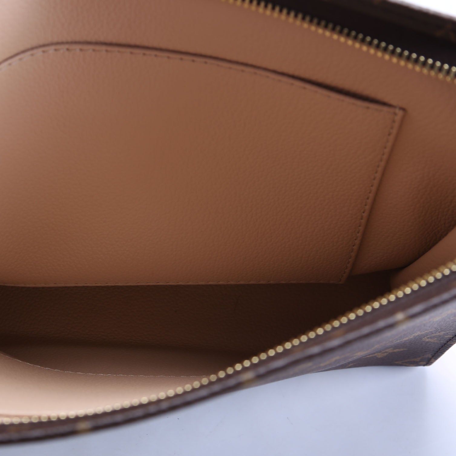 Pochette Toilette NM Monogram