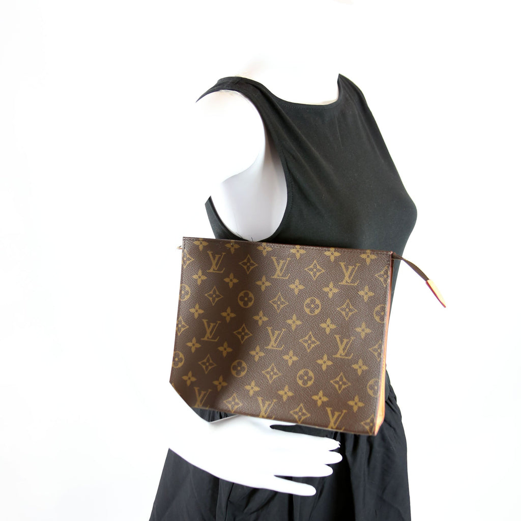 Pochette Toilette NM Monogram