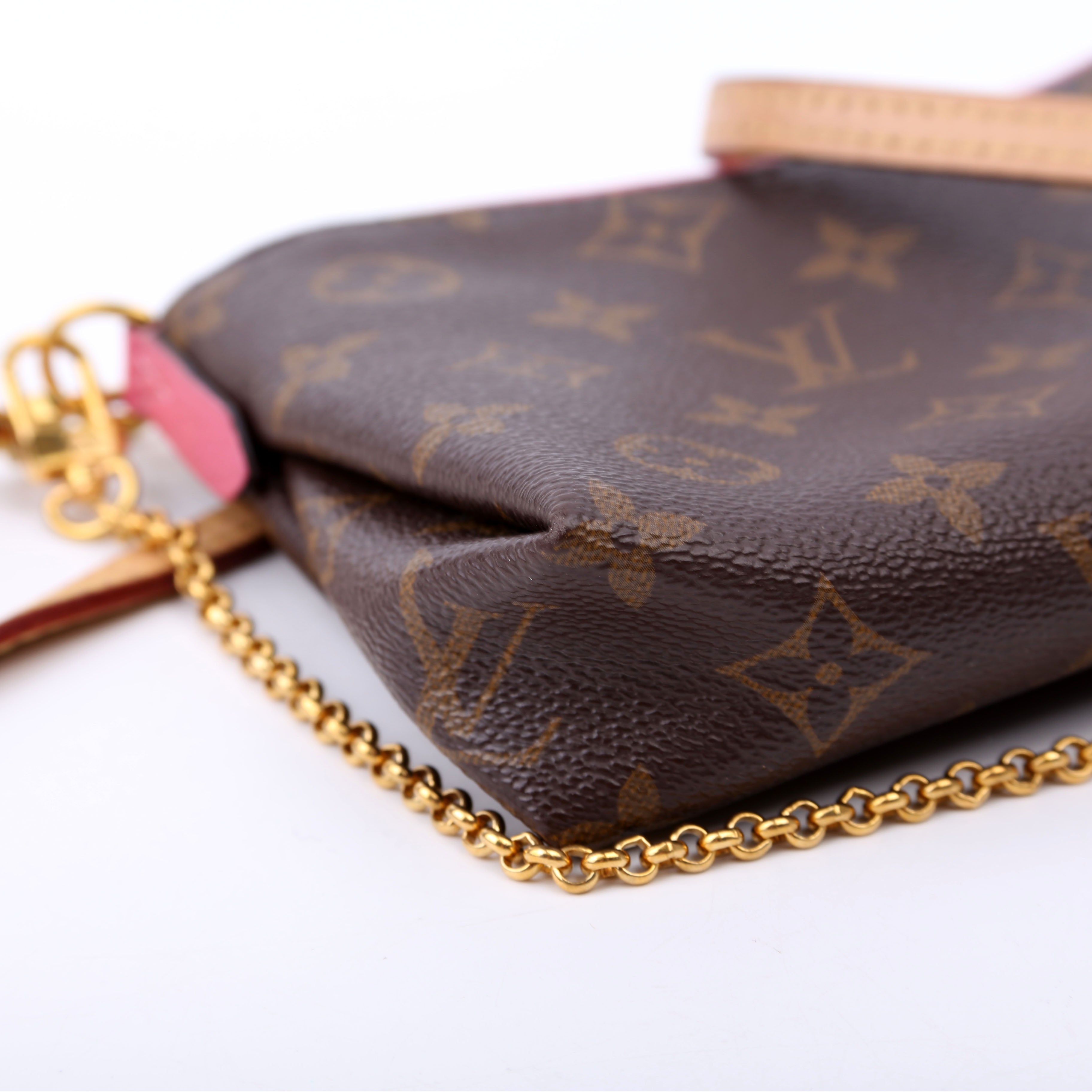 Pallas Clutch Monogram Pink