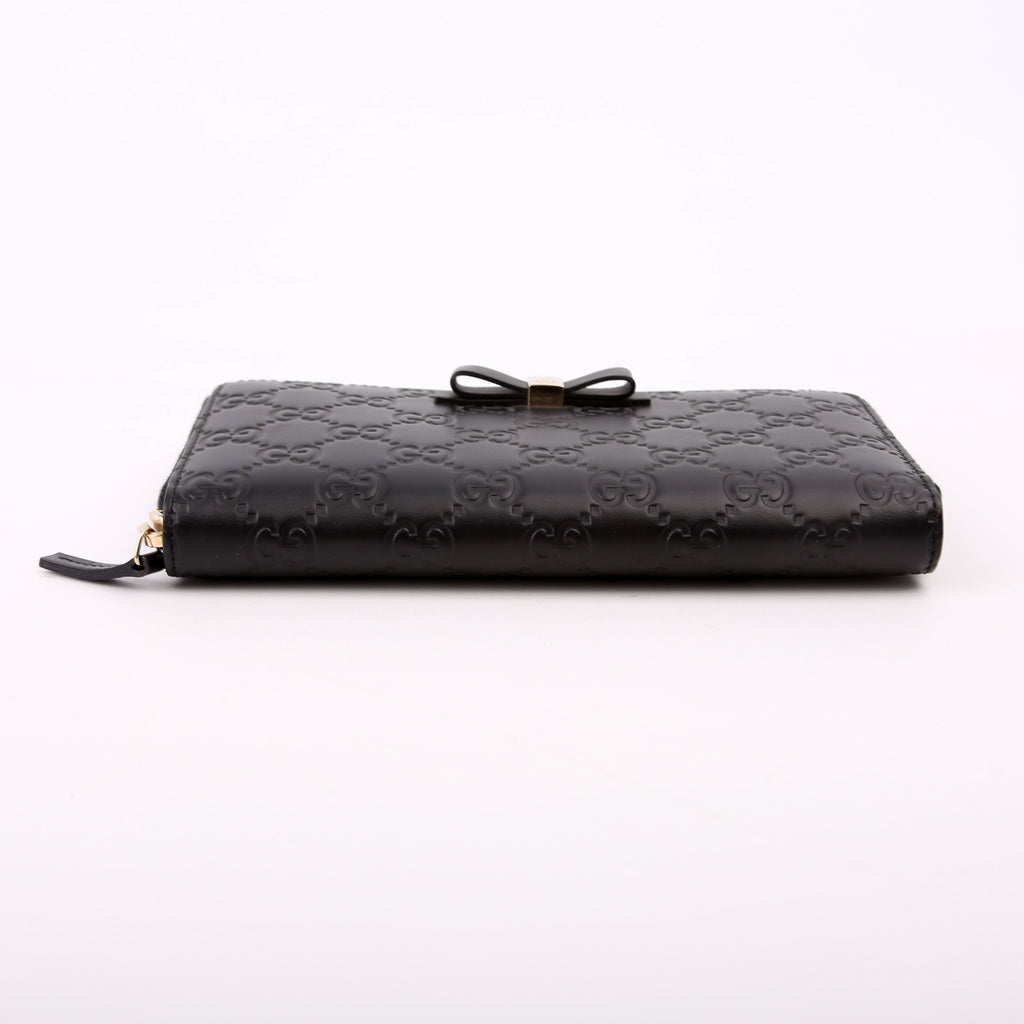 388680 Bow Zip Around Wallet Guccissima Black
