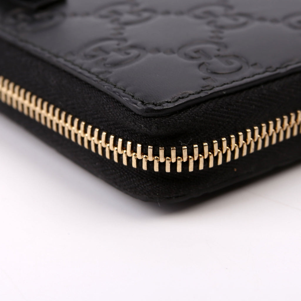 388680 Bow Zip Around Wallet Guccissima Black