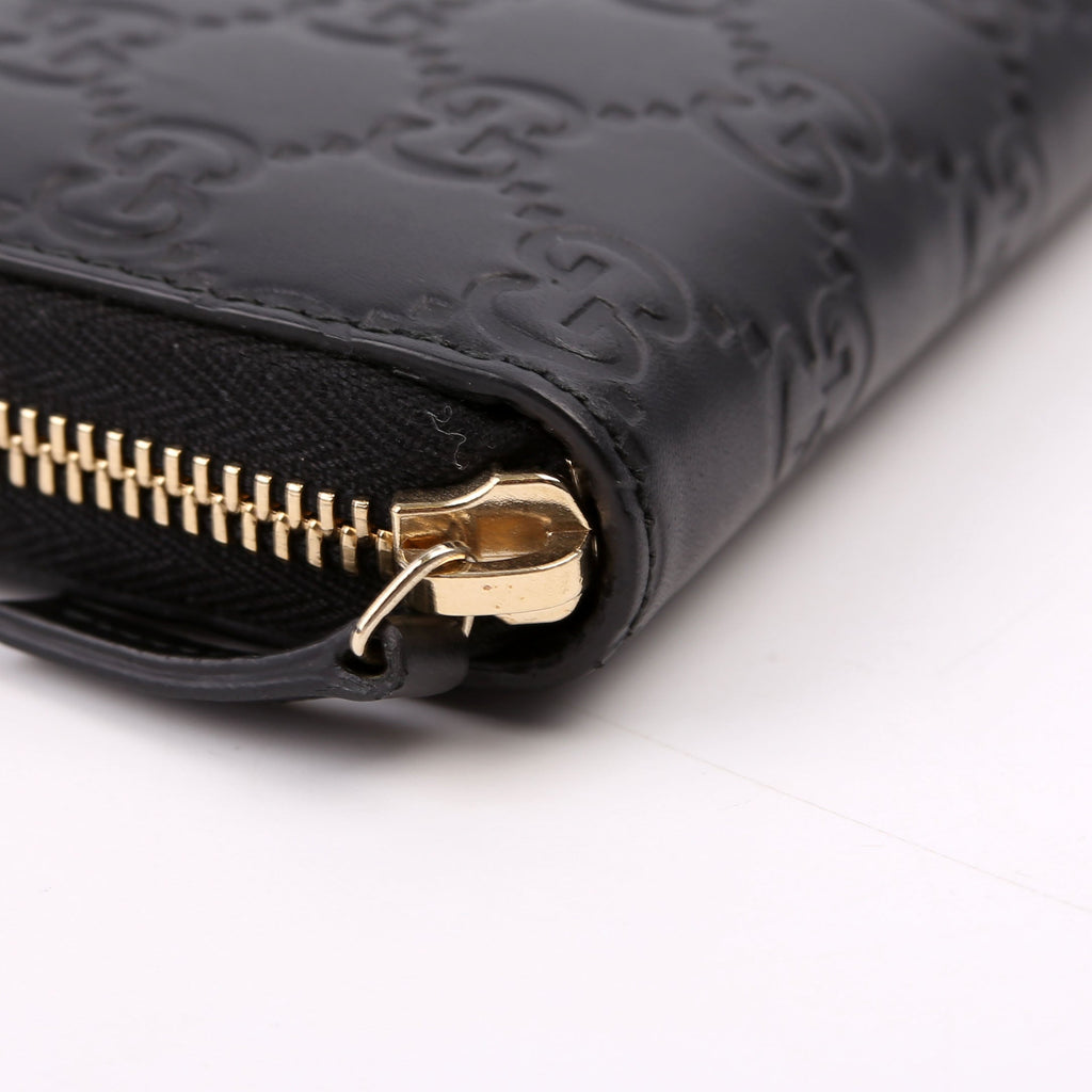 388680 Bow Zip Around Wallet Guccissima Black