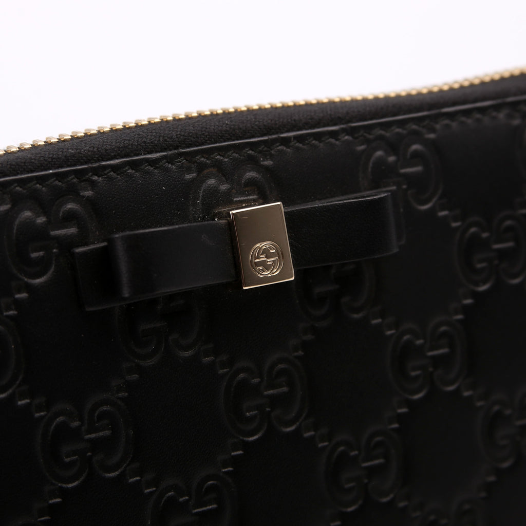 388680 Bow Zip Around Wallet Guccissima Black