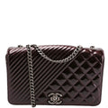 Coco Boy Flap Patent Iridescent Medium 21M Plum