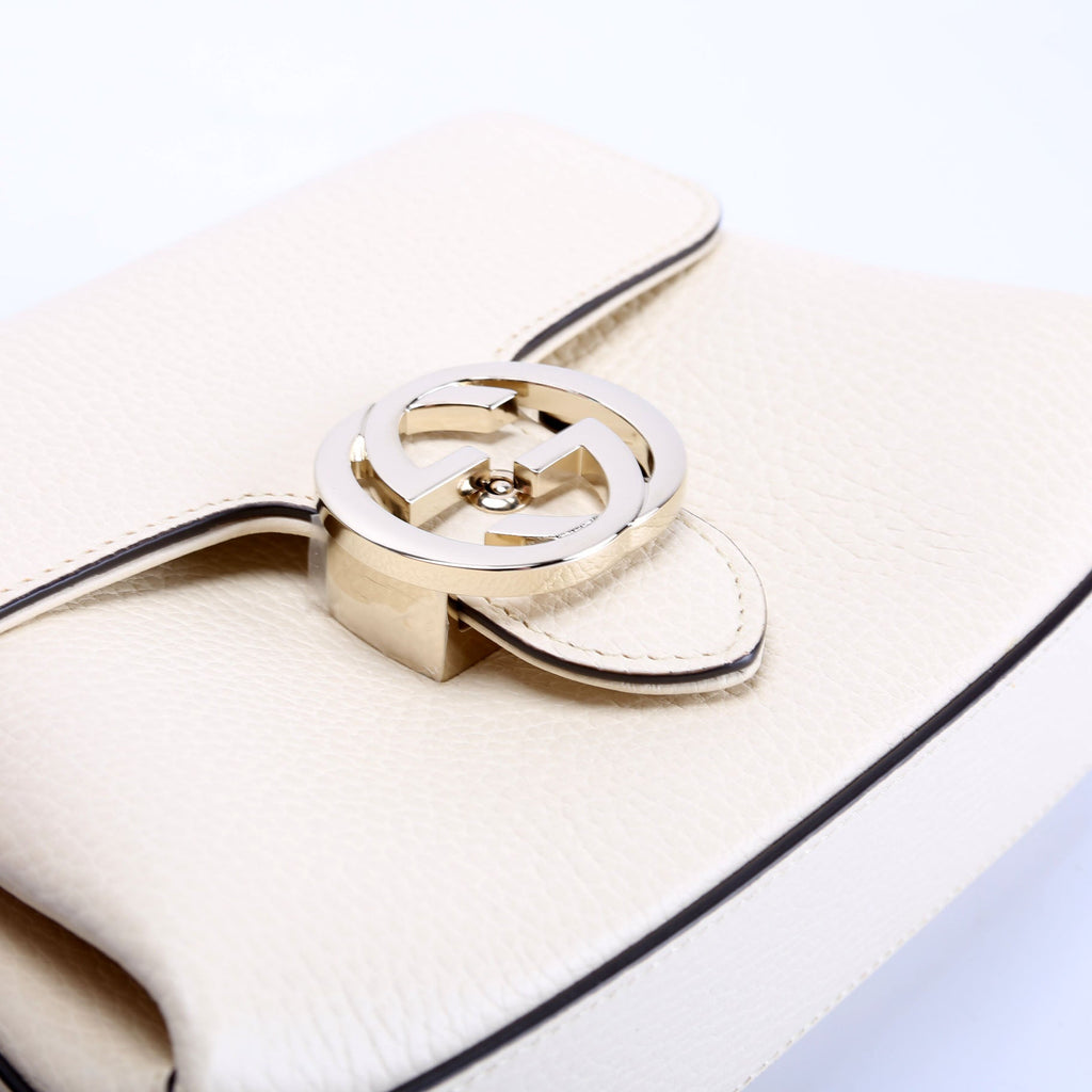 607720 Interlock Small Crossbody Cream