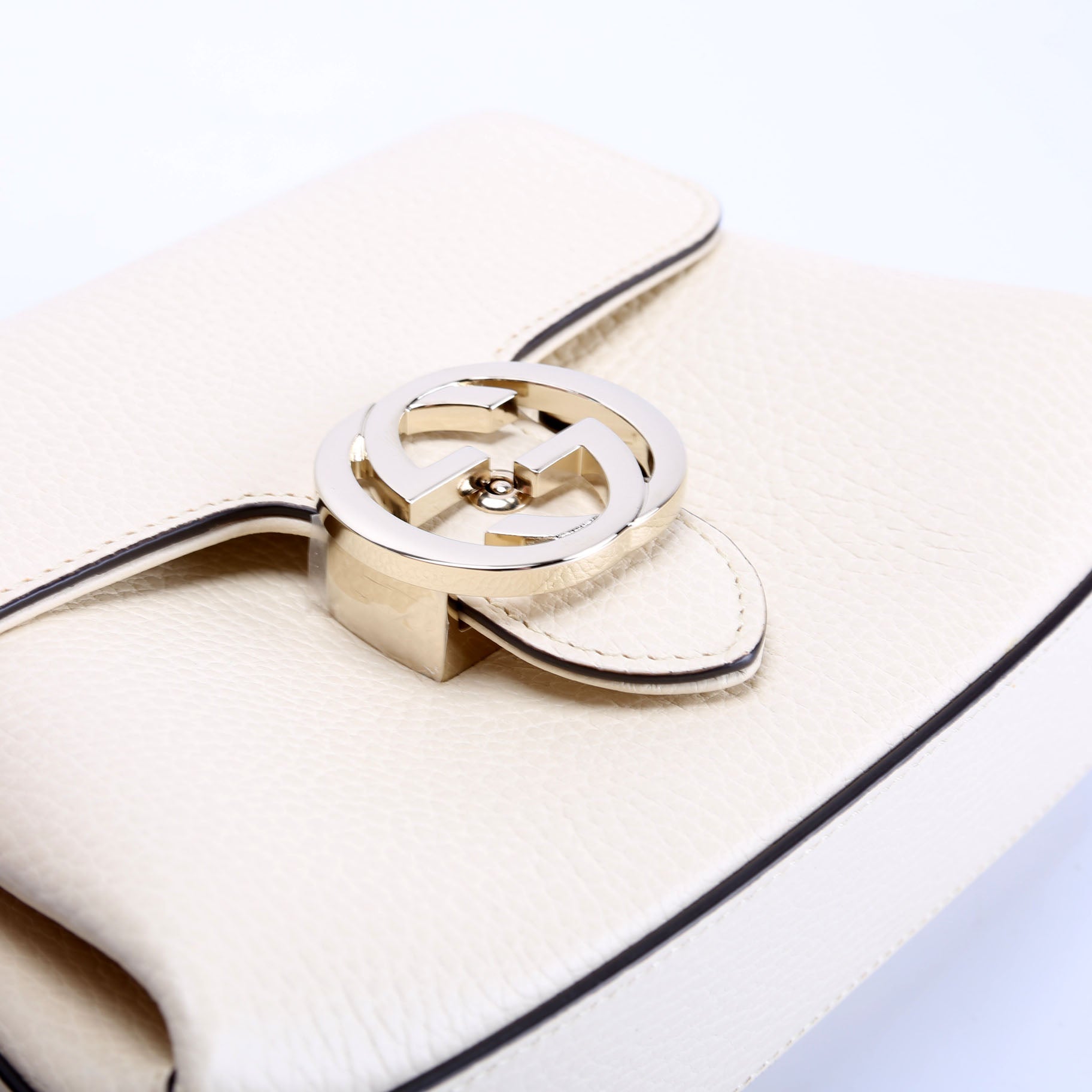 607720 Interlock Small Crossbody Cream