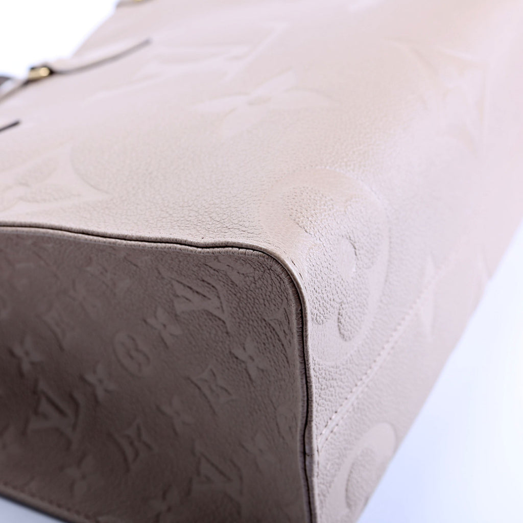 ONTHEGO MM Empreinte Leather Taupe