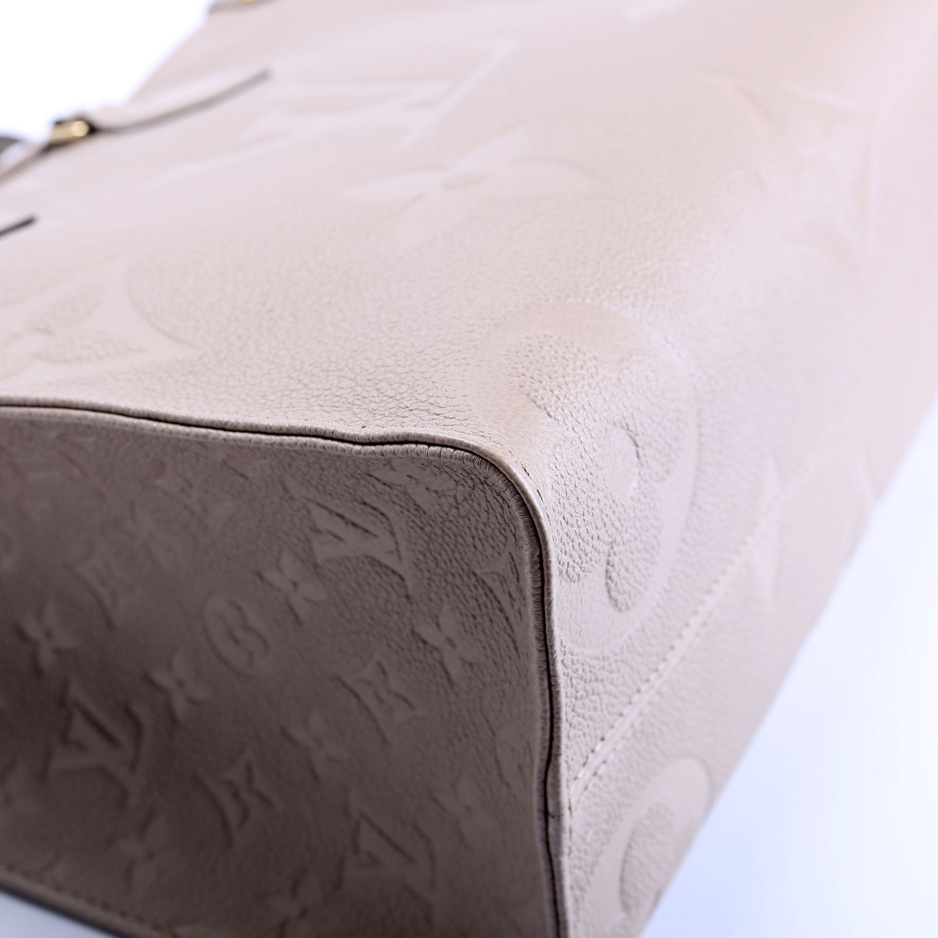 ONTHEGO MM Empreinte Leather Taupe
