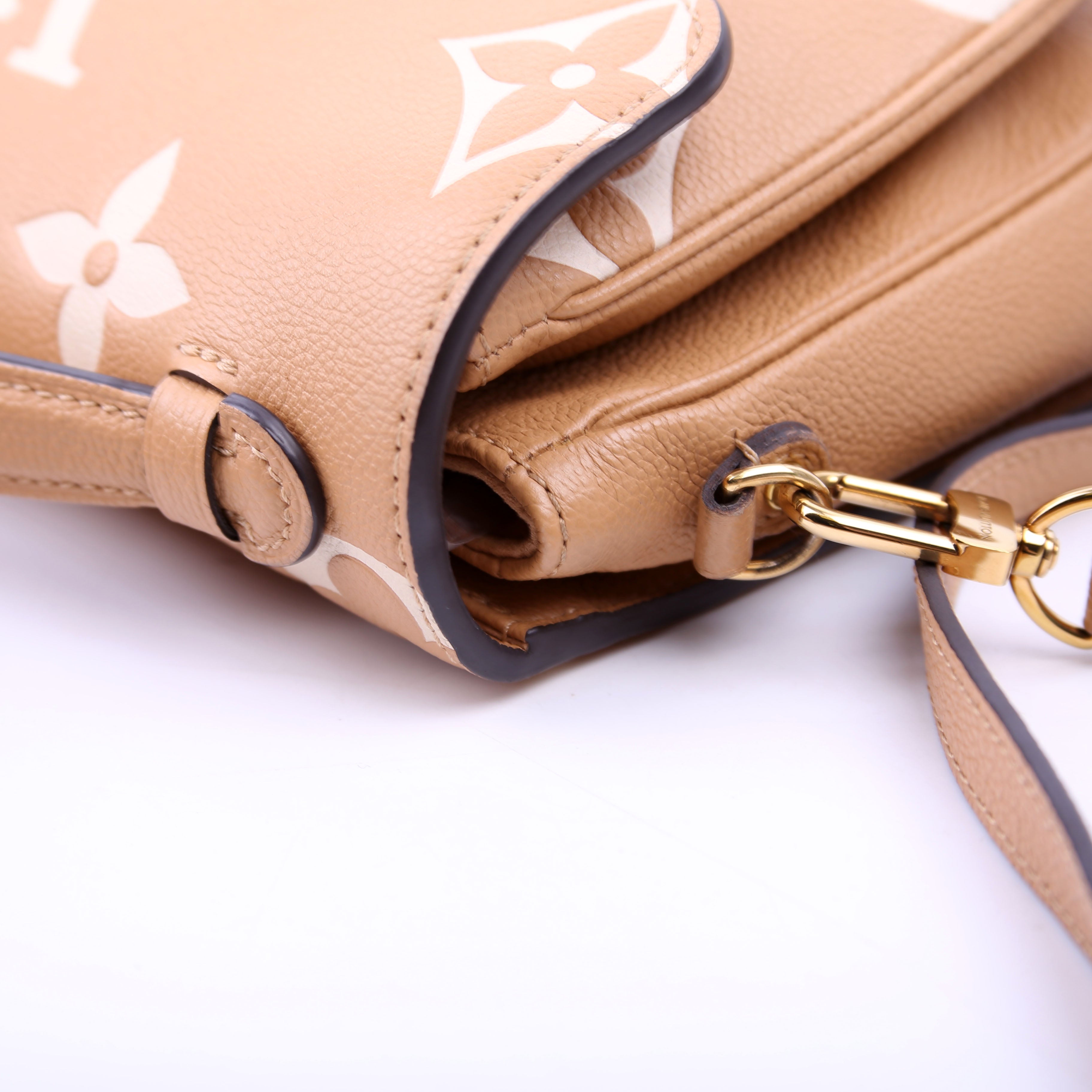 Pochette Metis Empreinte Bicolor Tan