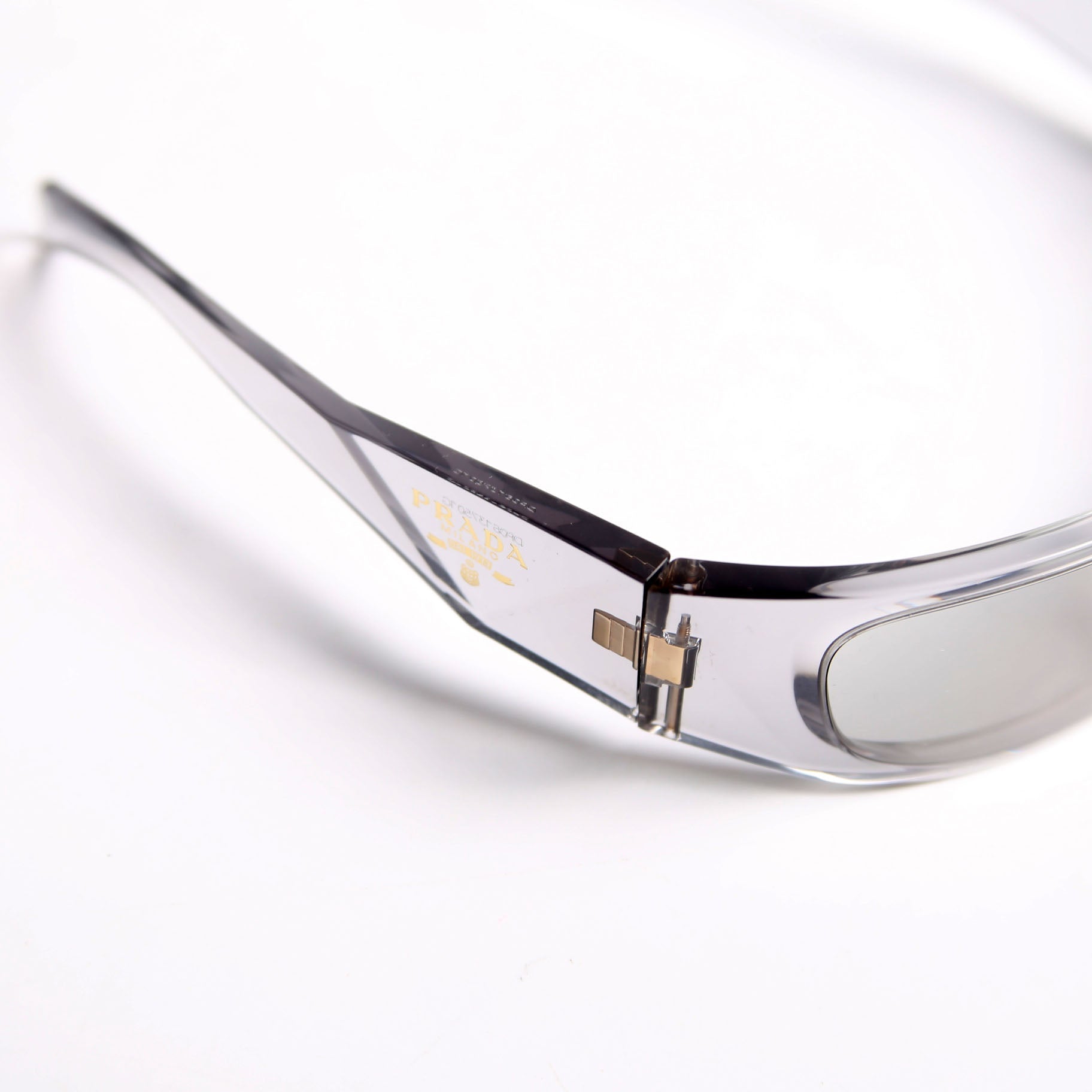 Prada SPR A14 Transparent Symbole Sunglasses Grey