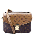 Pochette Metis Reverse Monogram Brown/Black/Gold