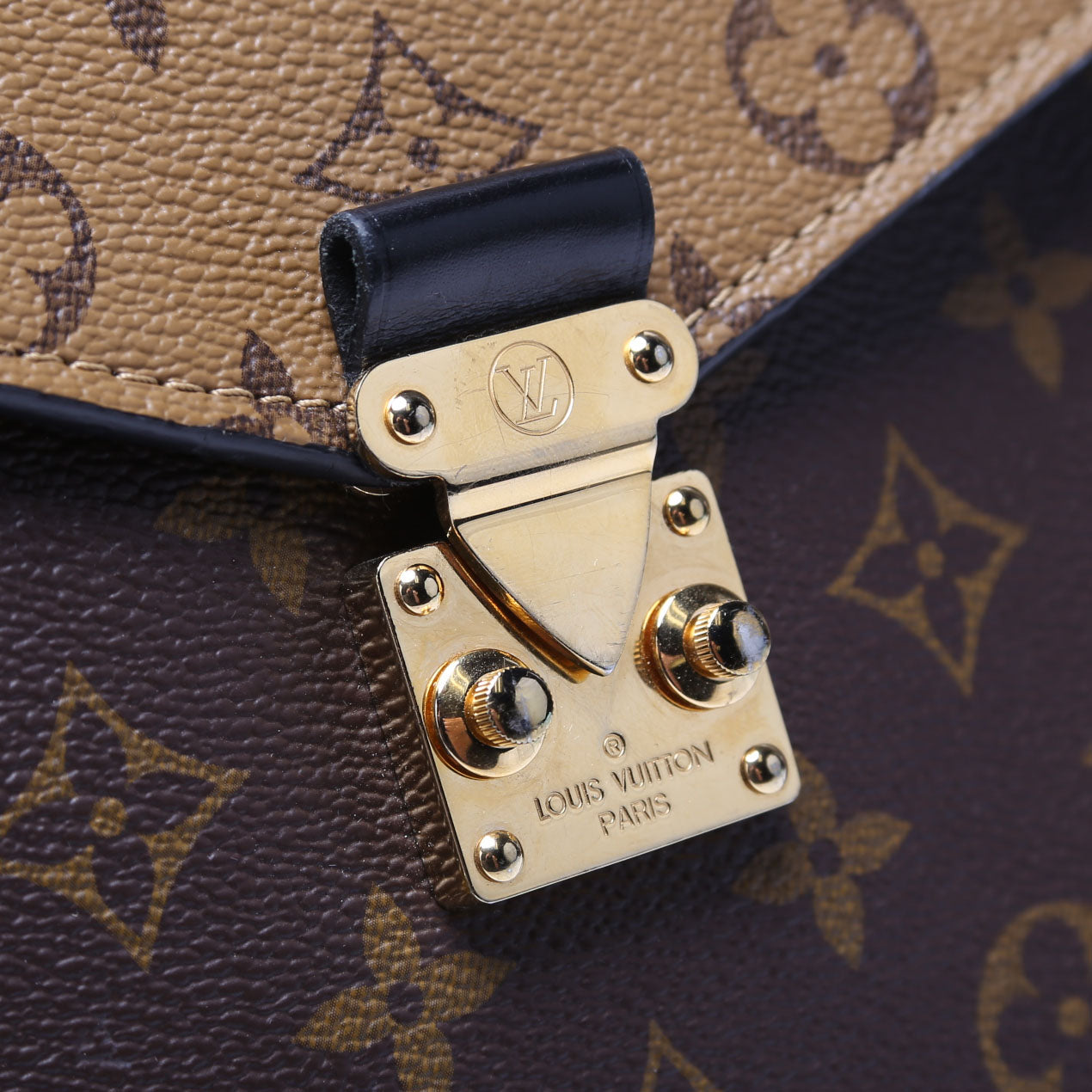 Pochette Metis Reverse Monogram Brown/Black/Gold