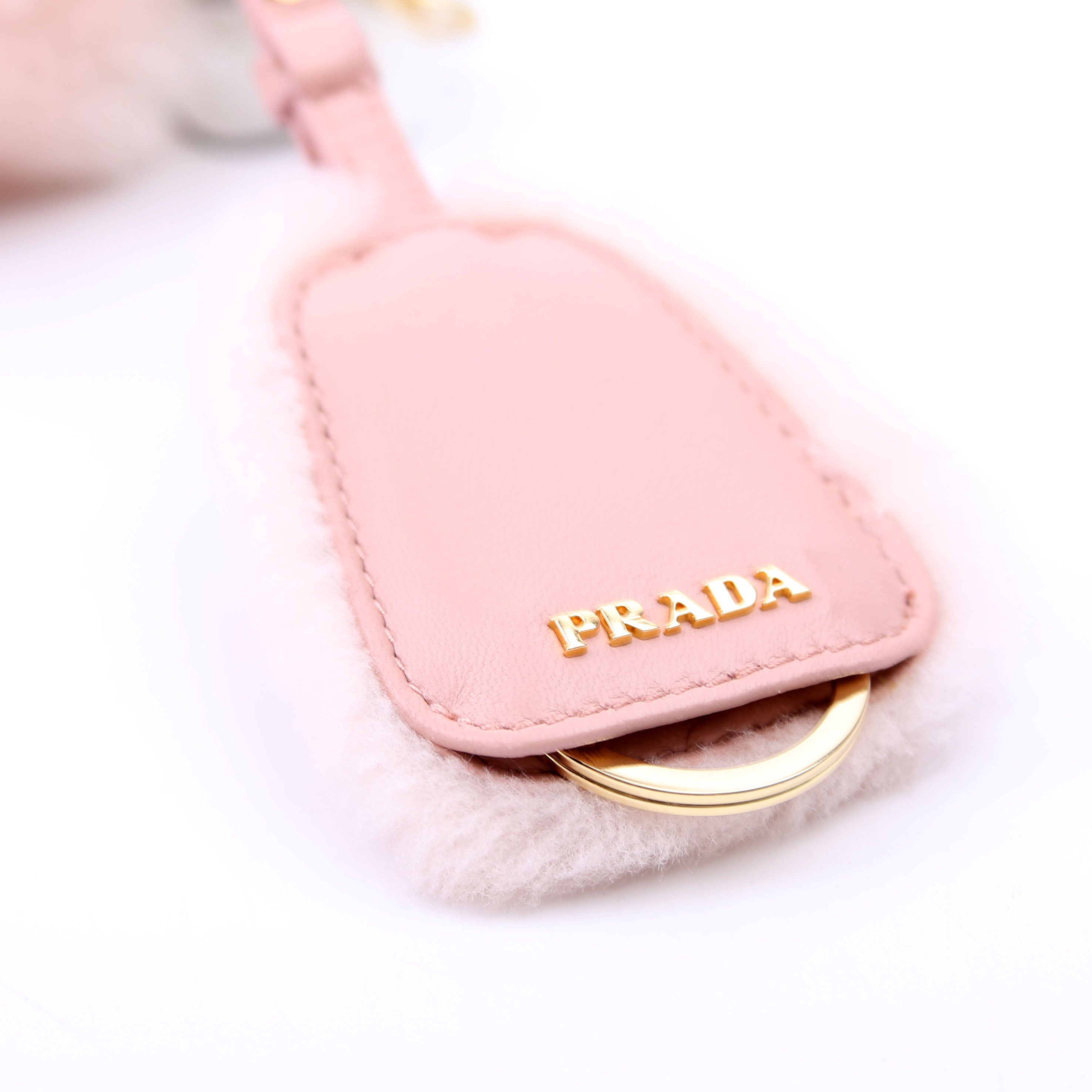 Prada Triangle Shearling Mini Bag Pink