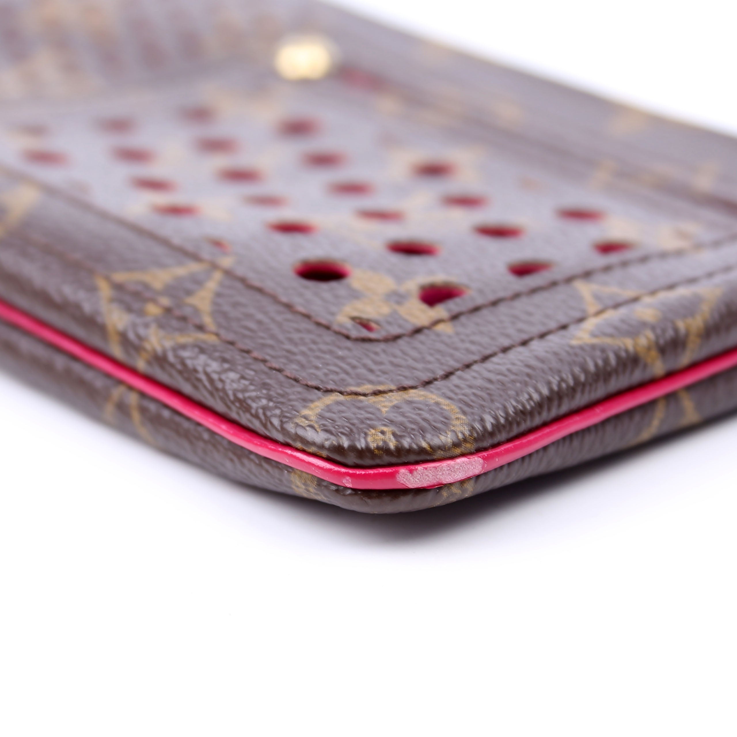 Pochette Plat Monogram Perforated Berry