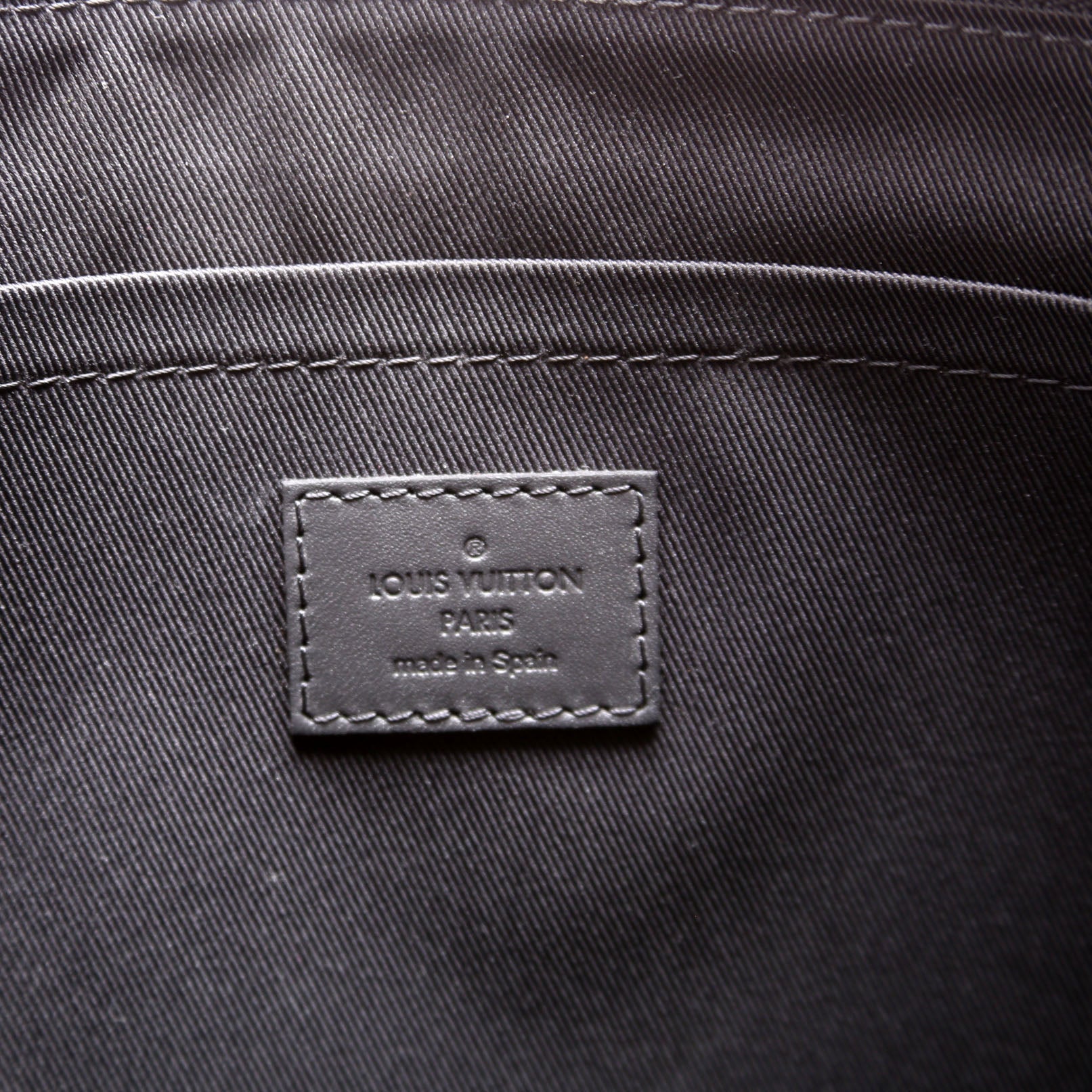Pochette Discovery GM Shadow Monogram