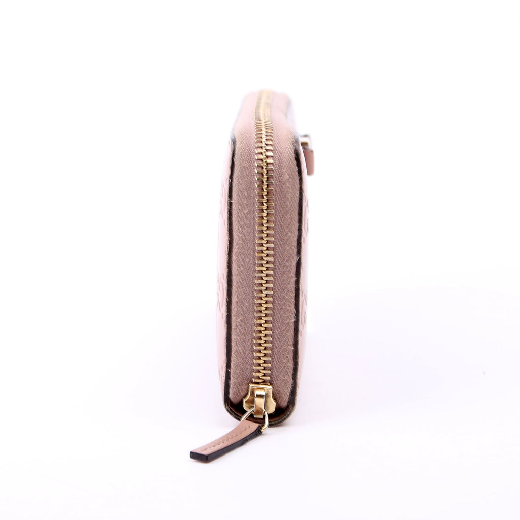 388680 Bow Zip Around Wallet Guccissima Nude