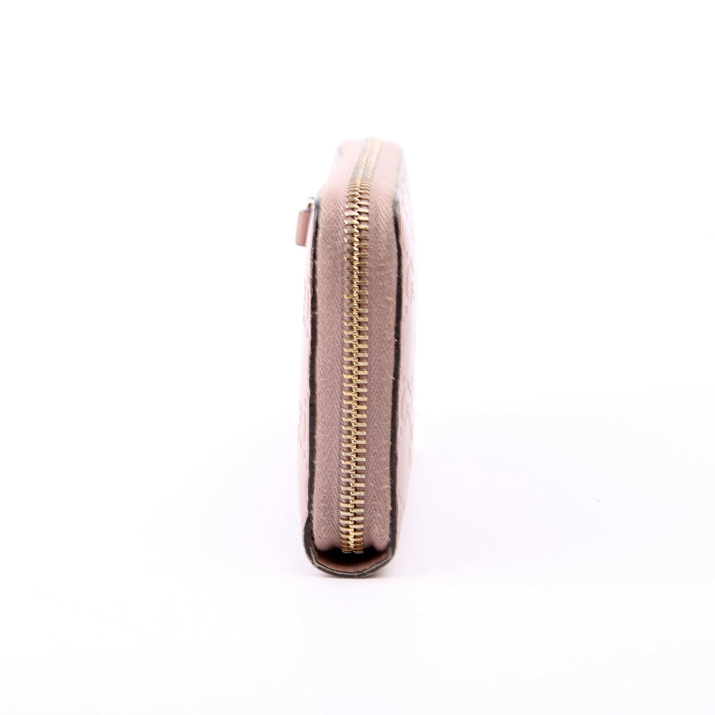 388680 Bow Zip Around Wallet Guccissima Nude