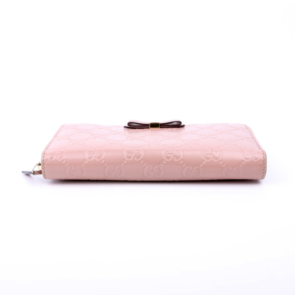 388680 Bow Zip Around Wallet Guccissima Nude