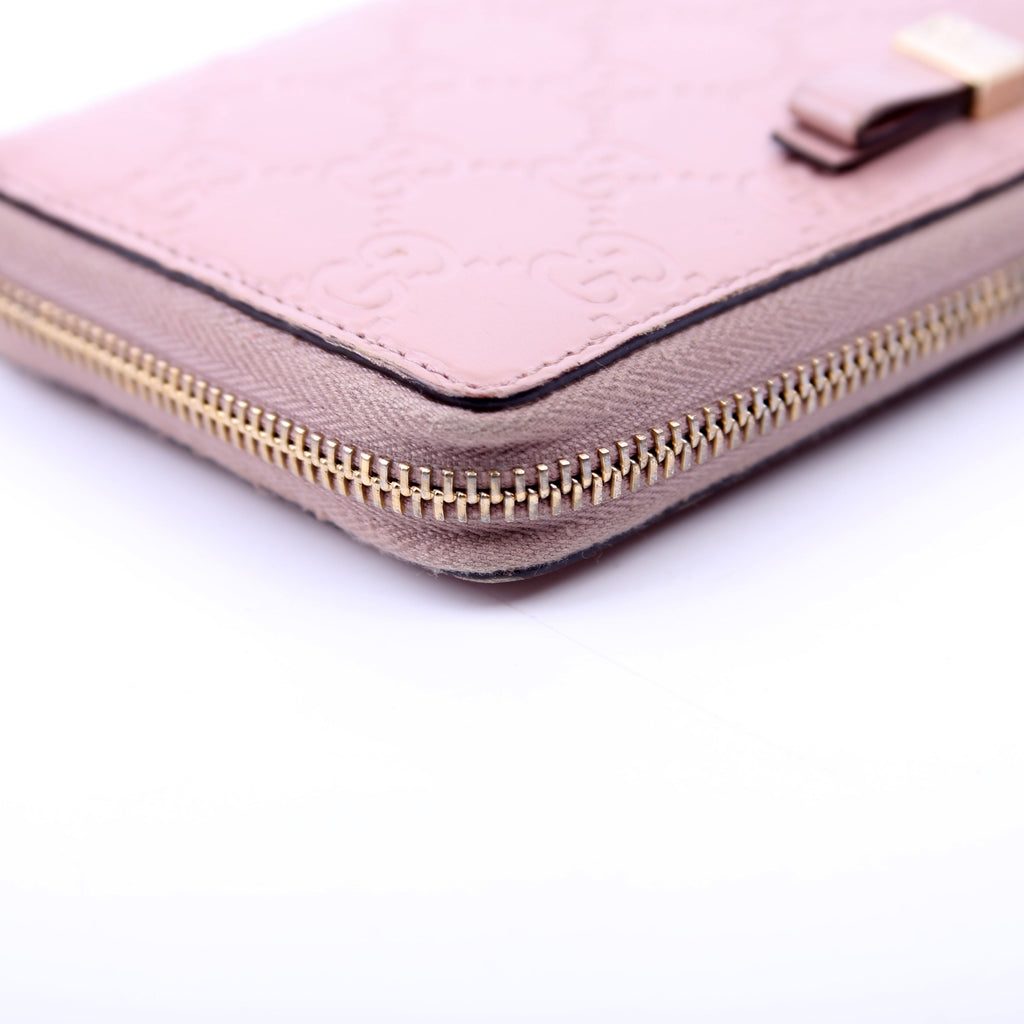 388680 Bow Zip Around Wallet Guccissima Nude