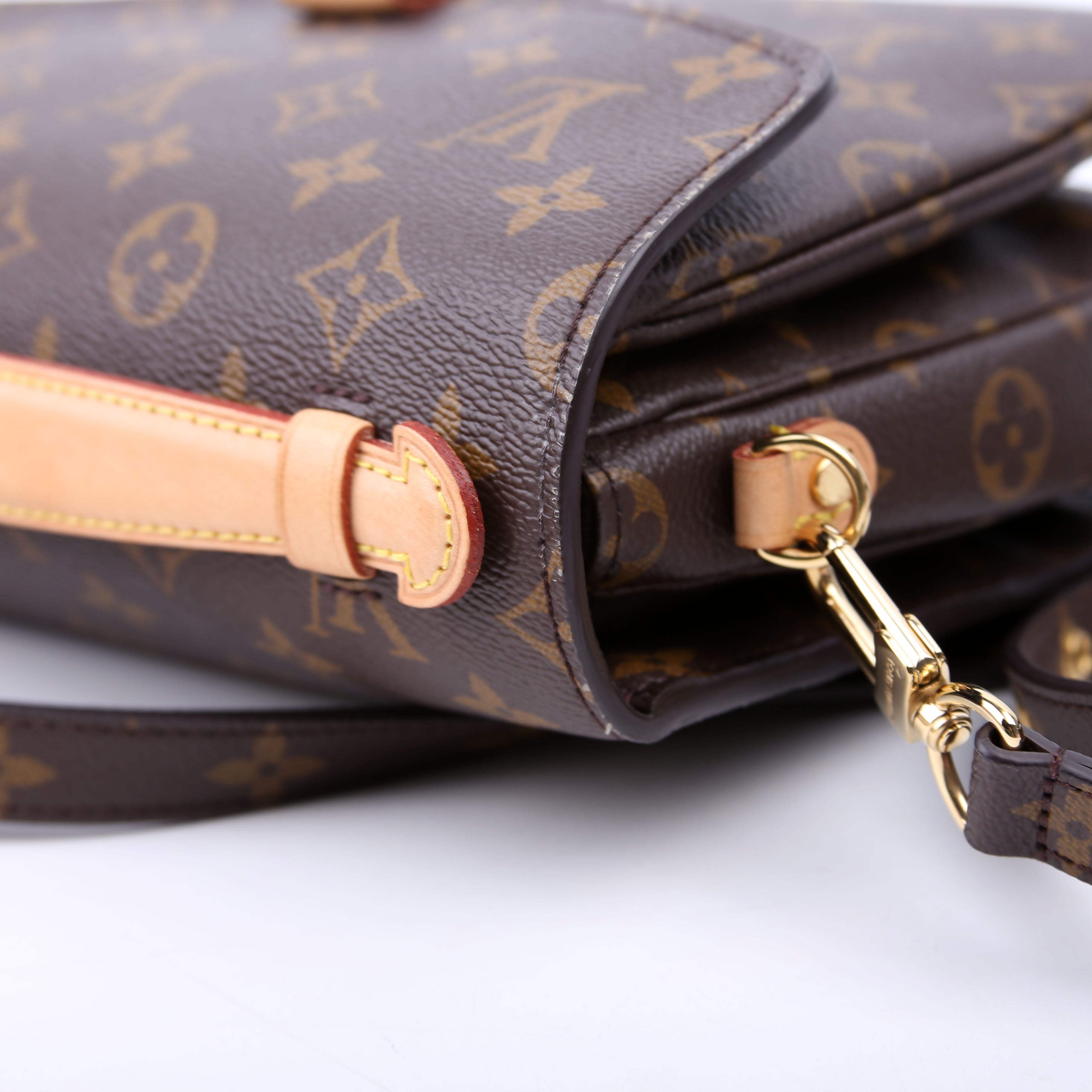Pochette Metis Monogram