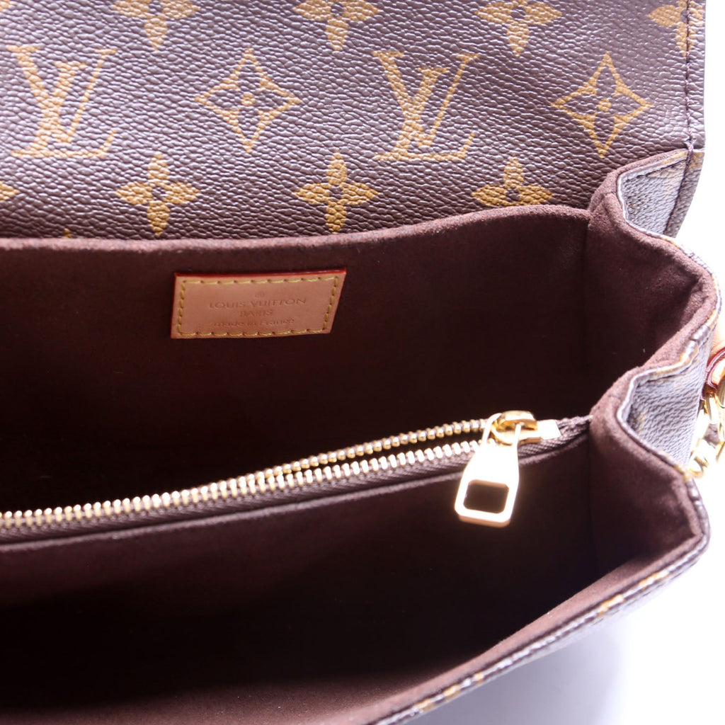 Pochette Metis East West Monogram