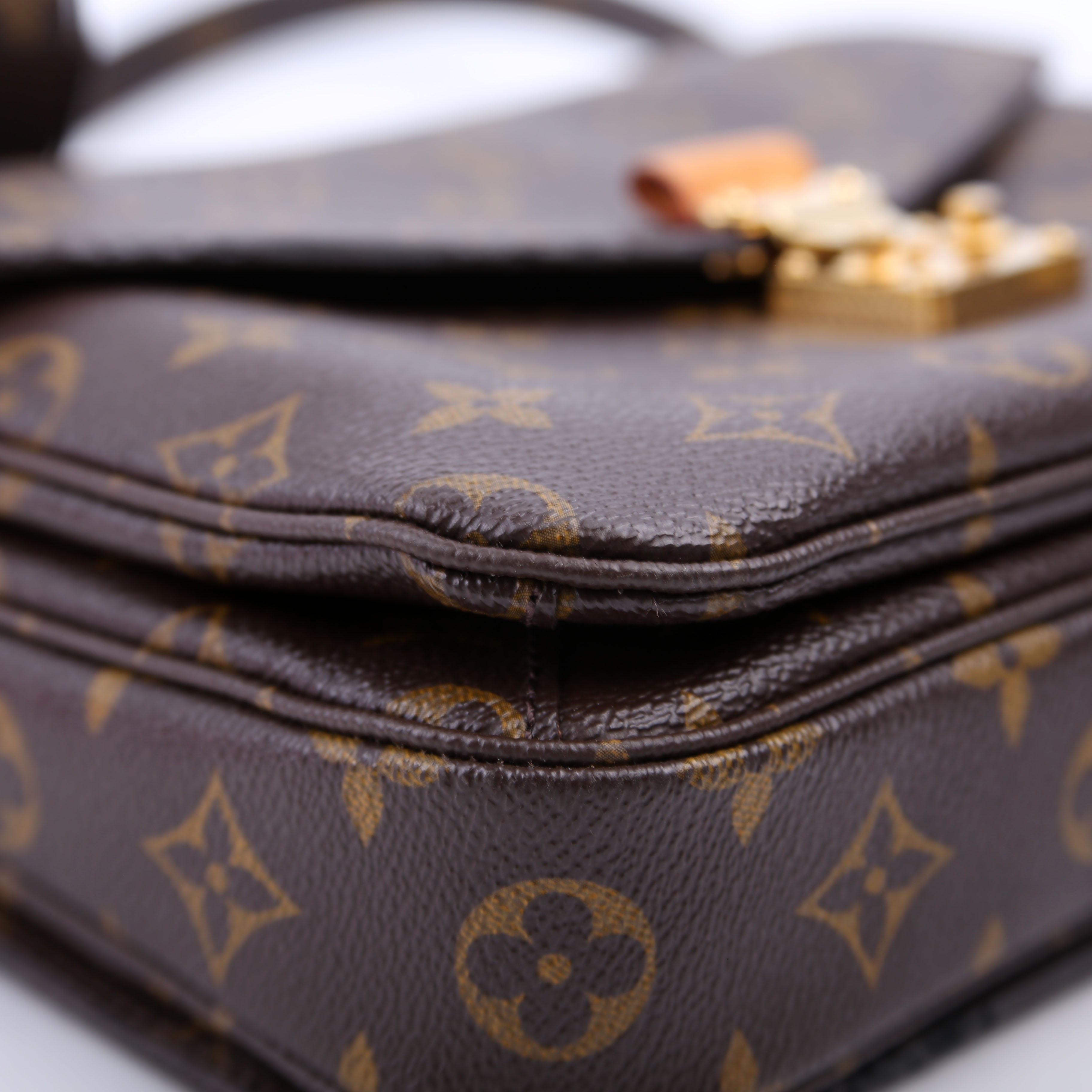 Pochette Metis Monogram