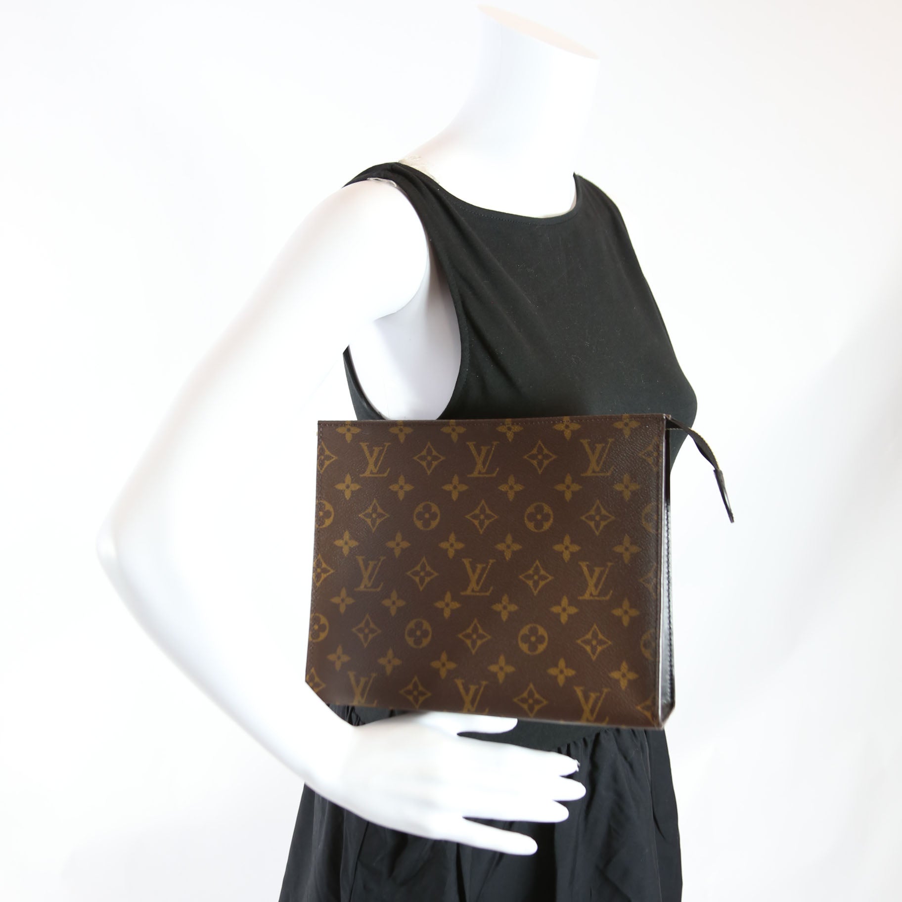 Pochette Toilette NM Monogram