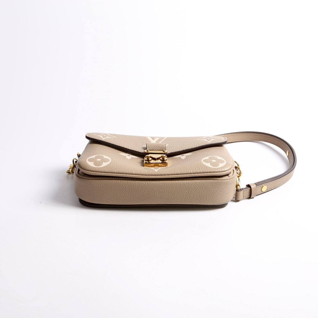 Pochette Metis East West Bicolor Empreinte Turtle Dove