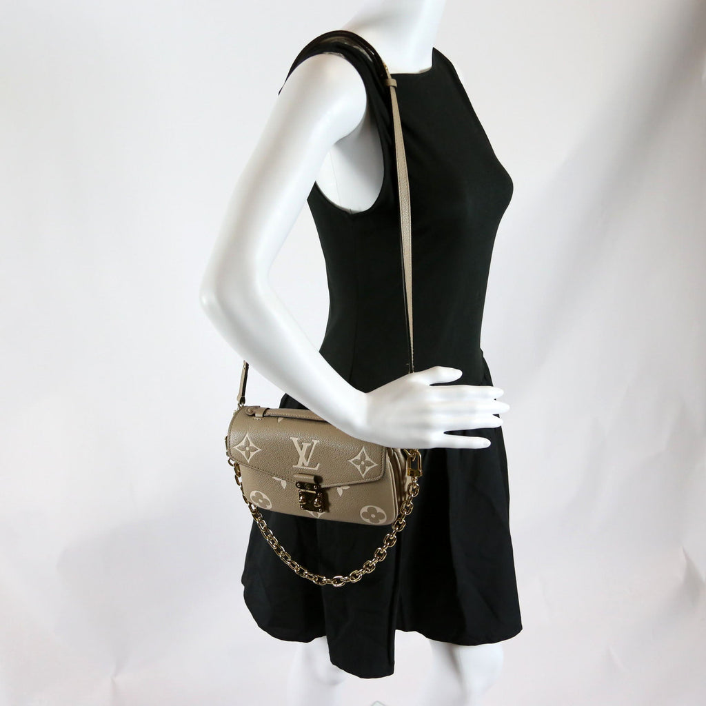 Pochette Metis East West Bicolor Empreinte Turtle Dove