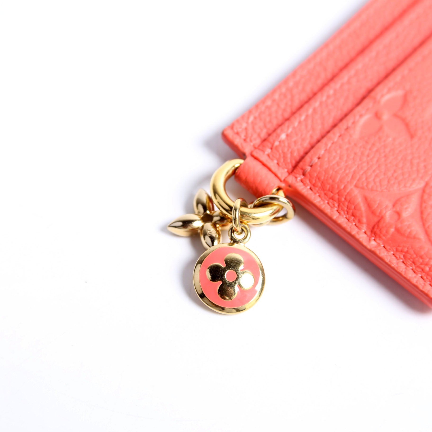 LV Charms Holder Empreinte Coral