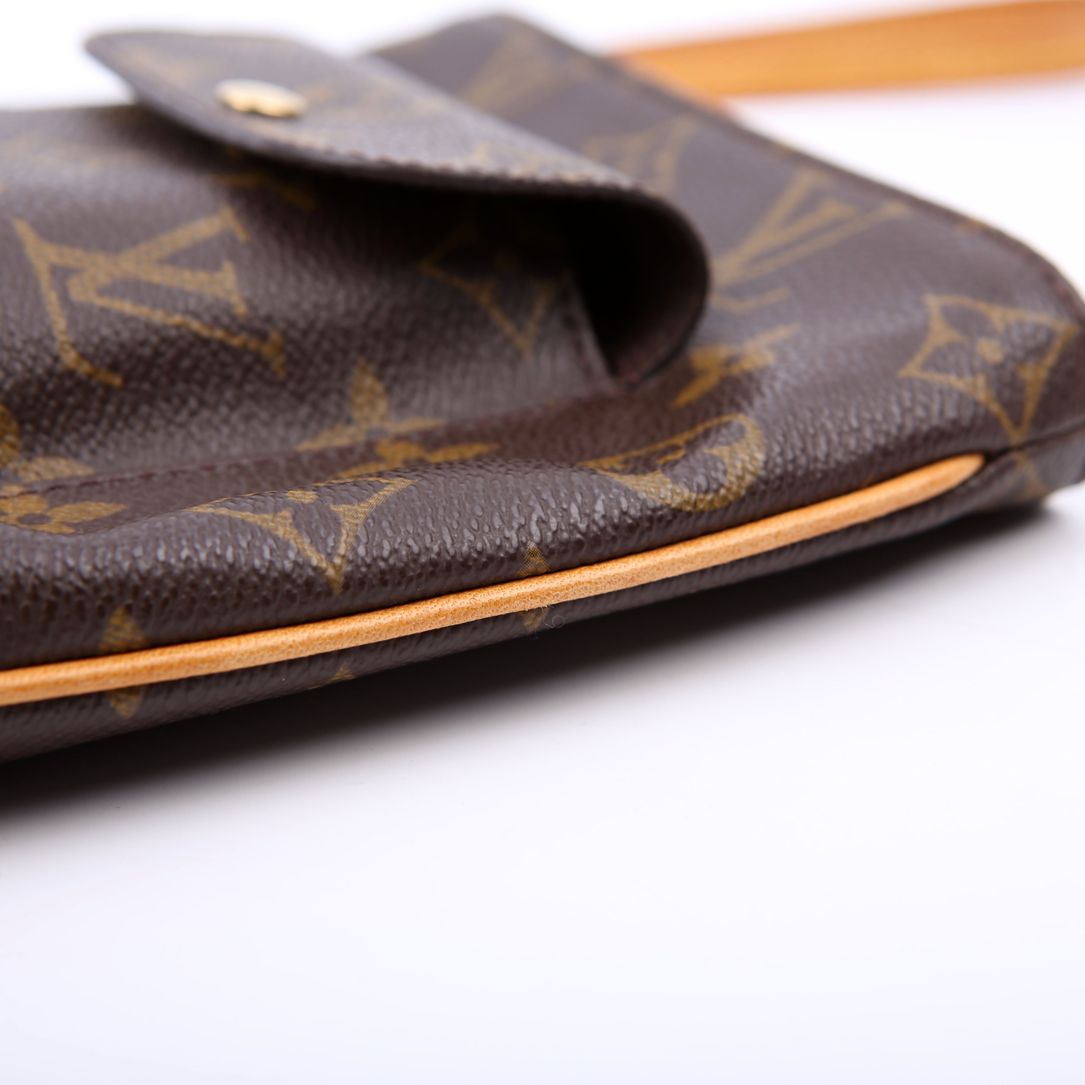 Partition Wristlet Clutch Monogram