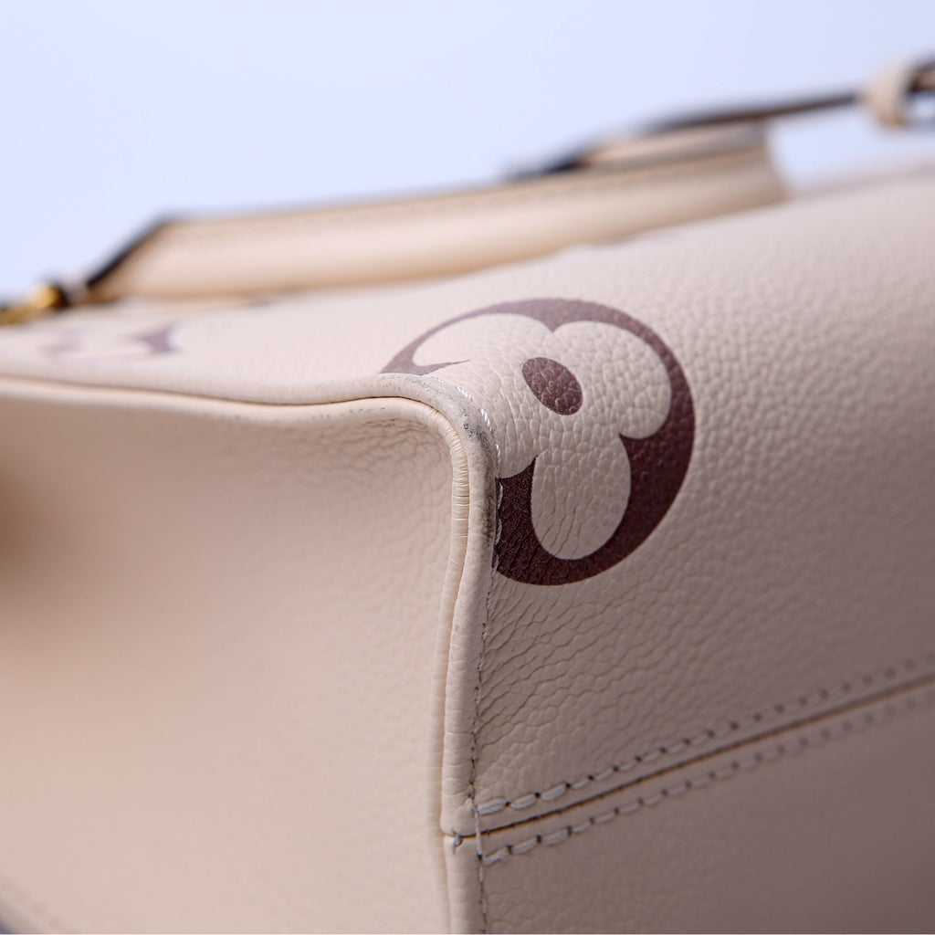 ONTHEGO PM Bicolor Empreinte Cream/Taupe