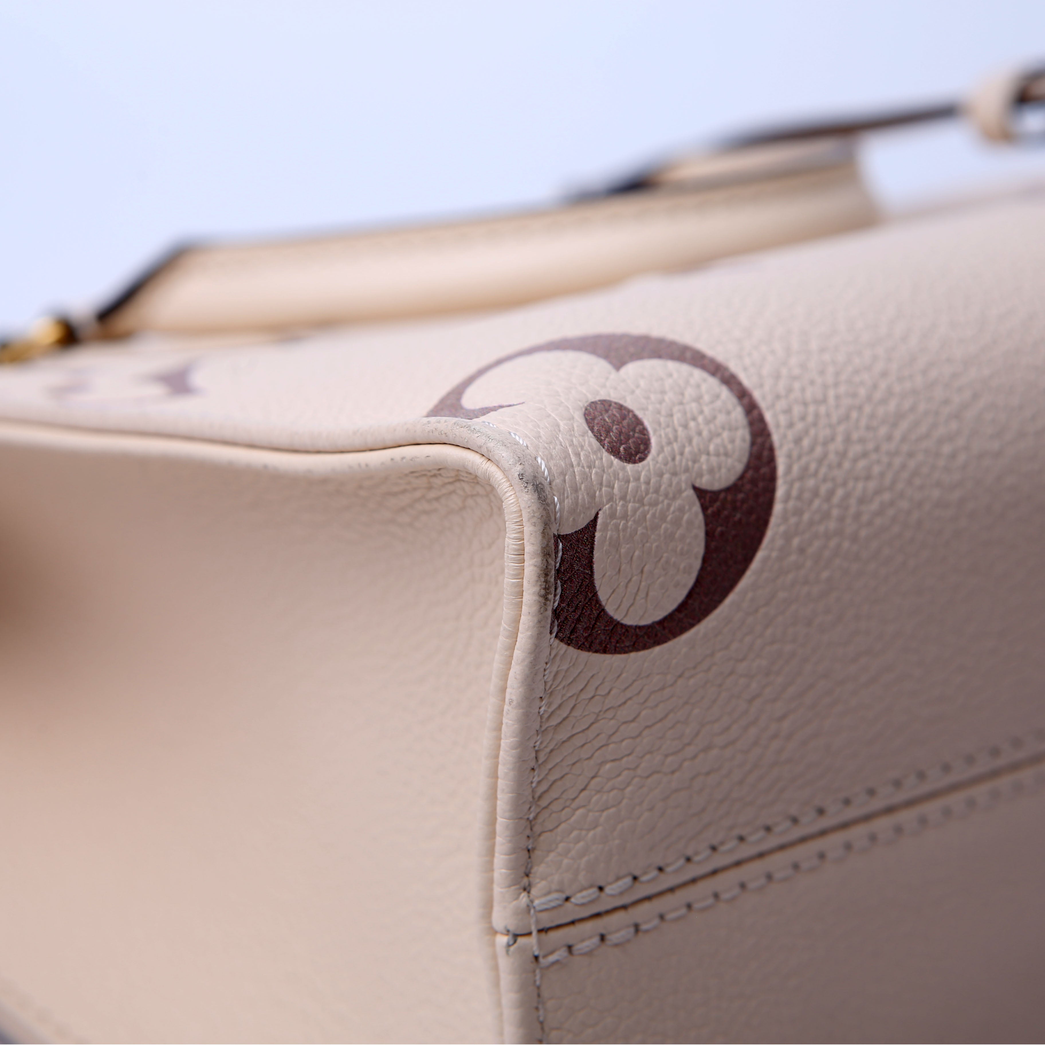 ONTHEGO PM Bicolor Empreinte Cream/Taupe
