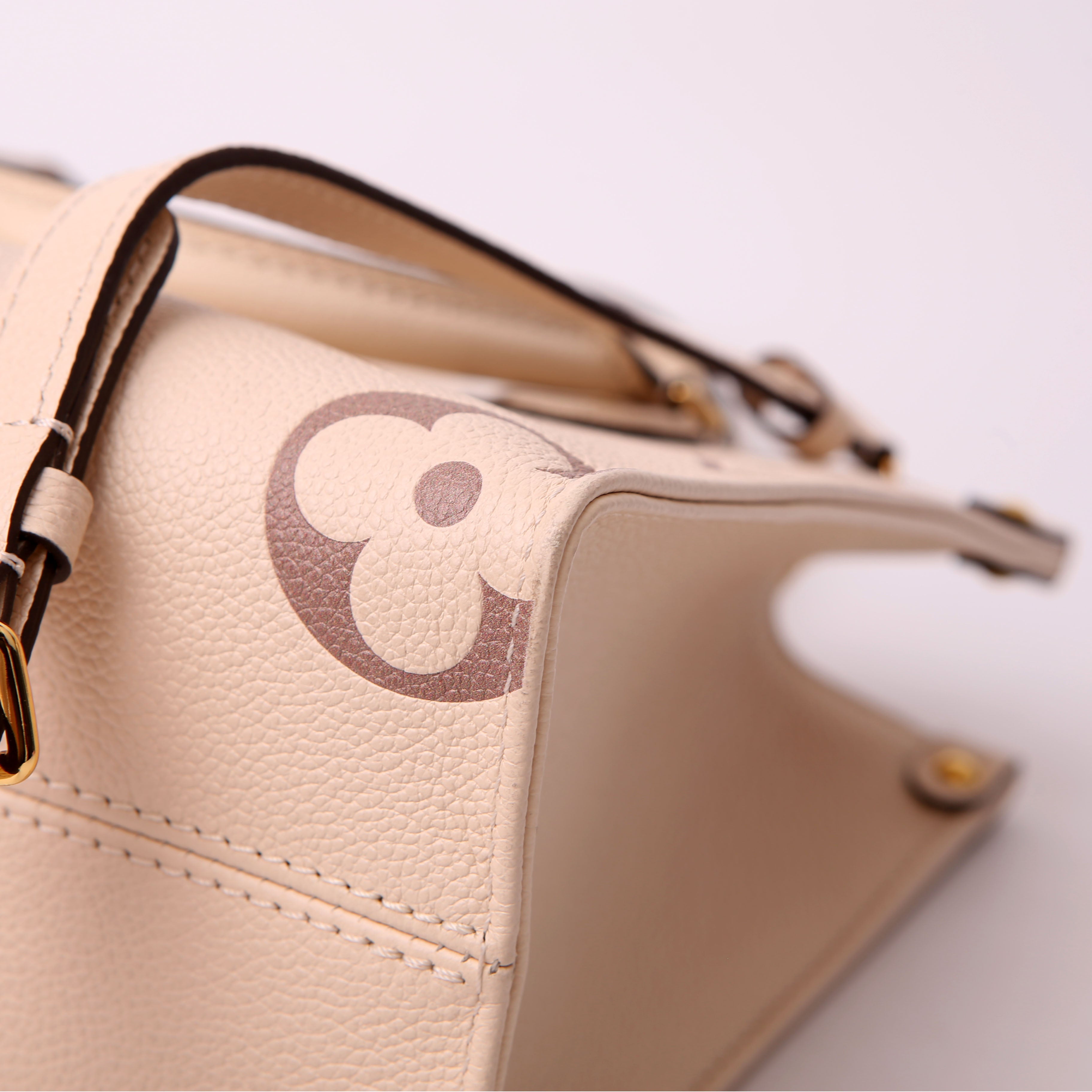 ONTHEGO PM Bicolor Empreinte Cream/Taupe