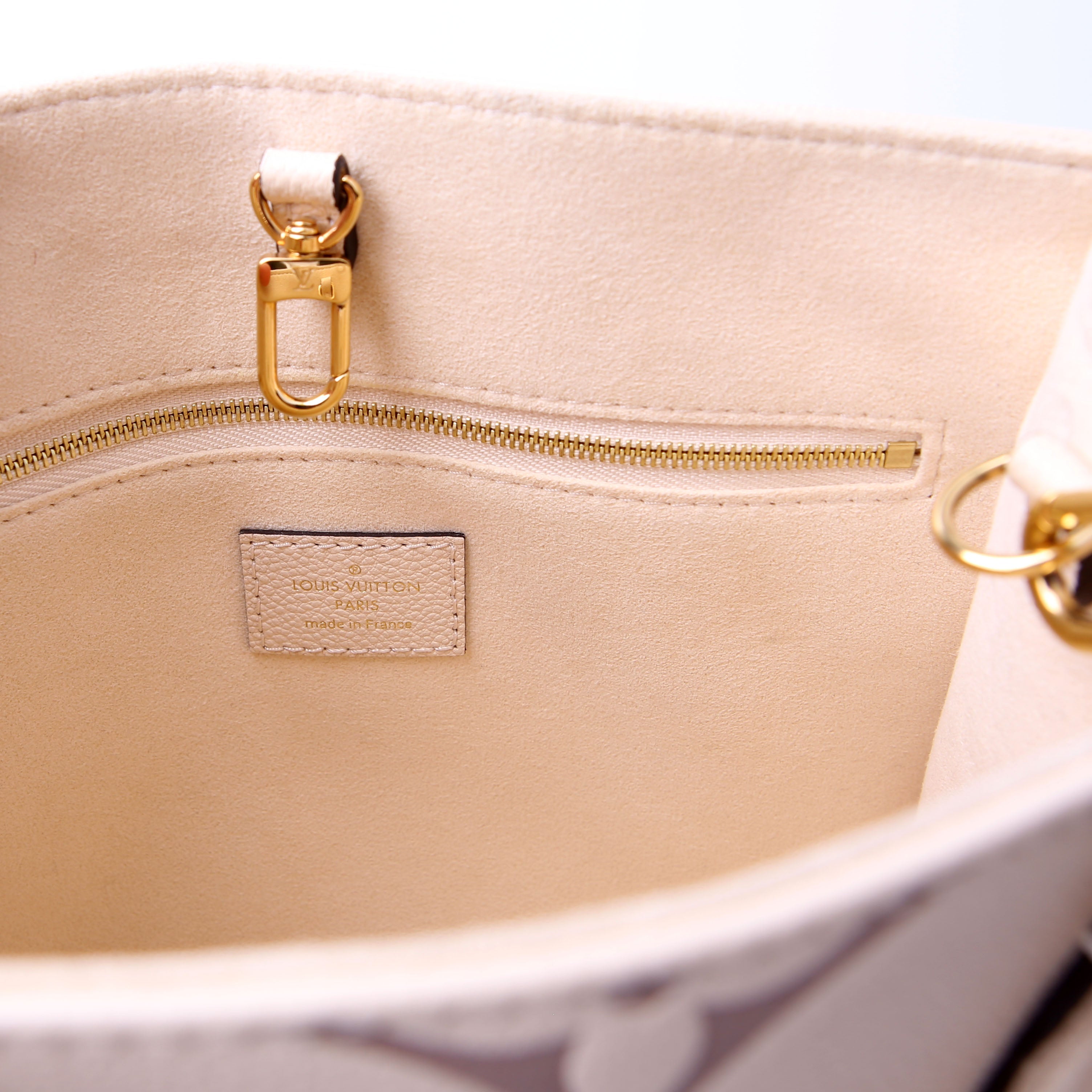 ONTHEGO PM Bicolor Empreinte Cream/Taupe