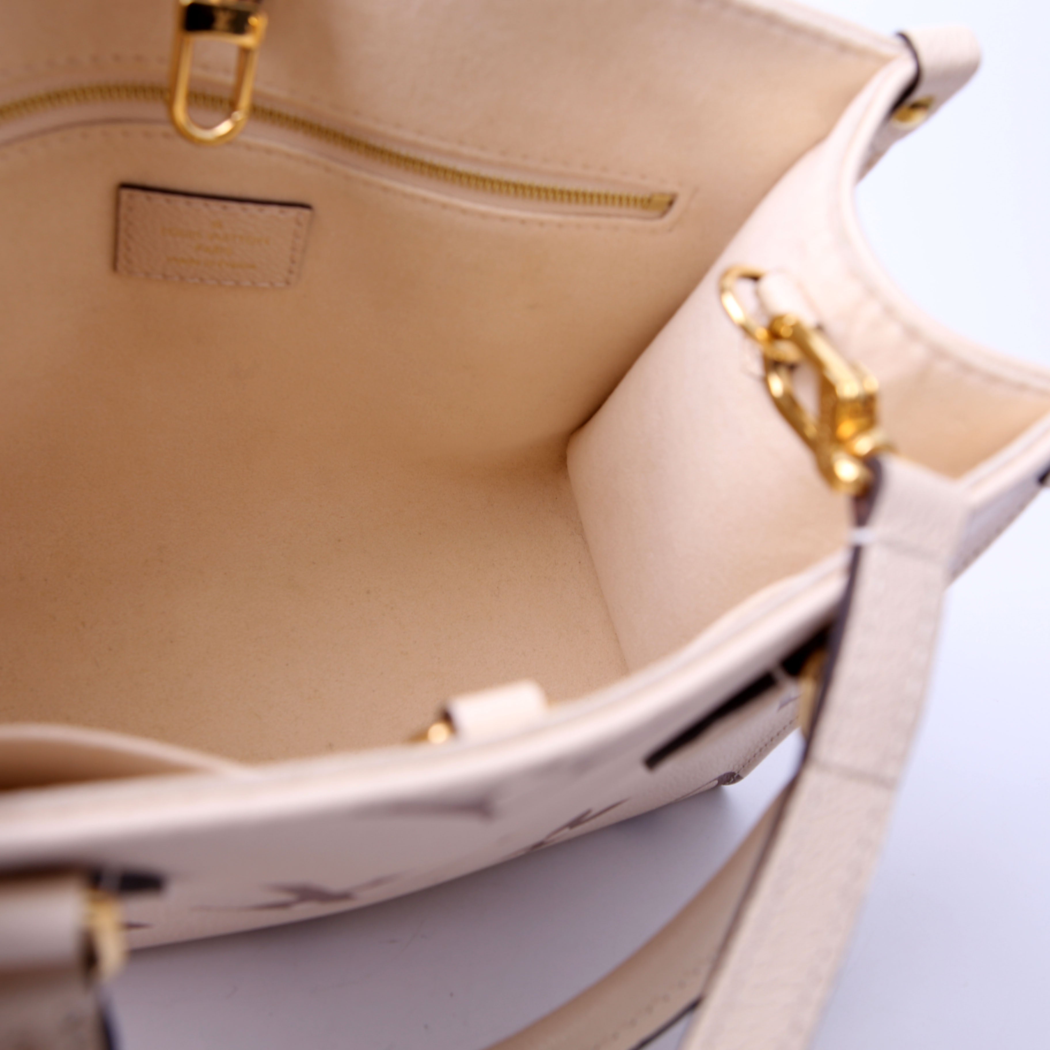 ONTHEGO PM Bicolor Empreinte Cream/Taupe