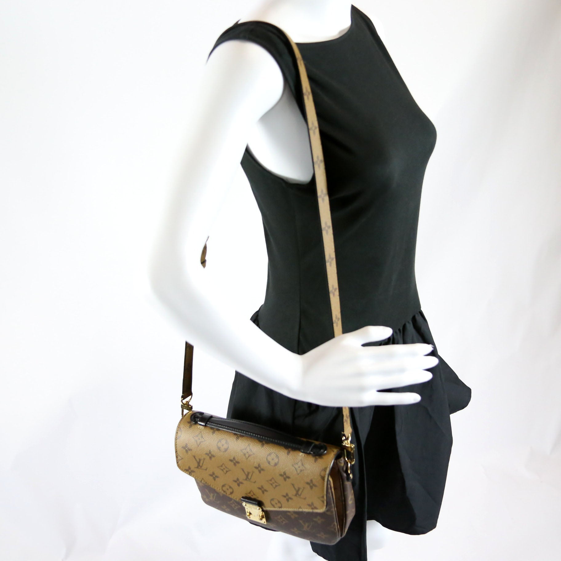 Pochette Metis Reverse Monogram