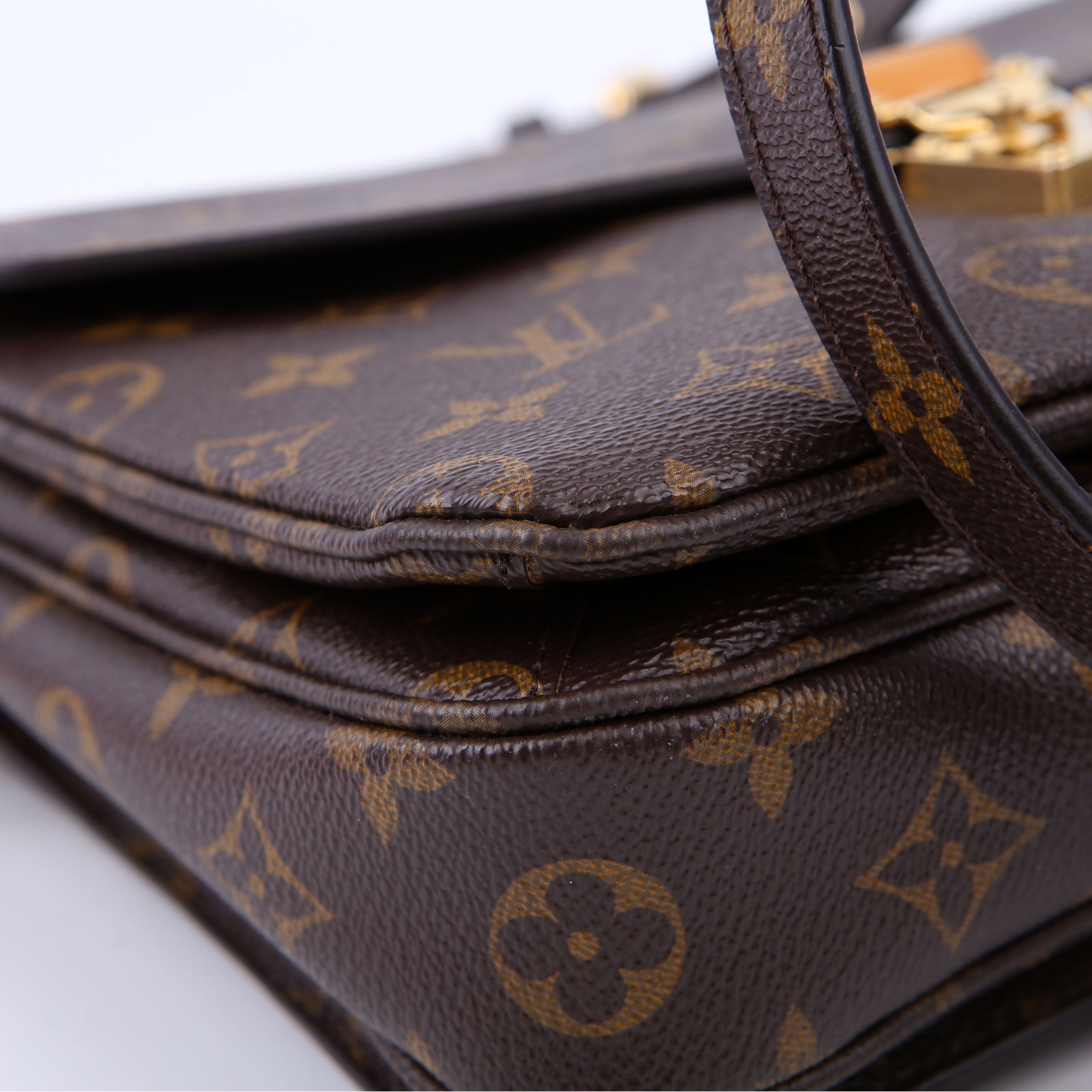 Pochette Metis Monogram