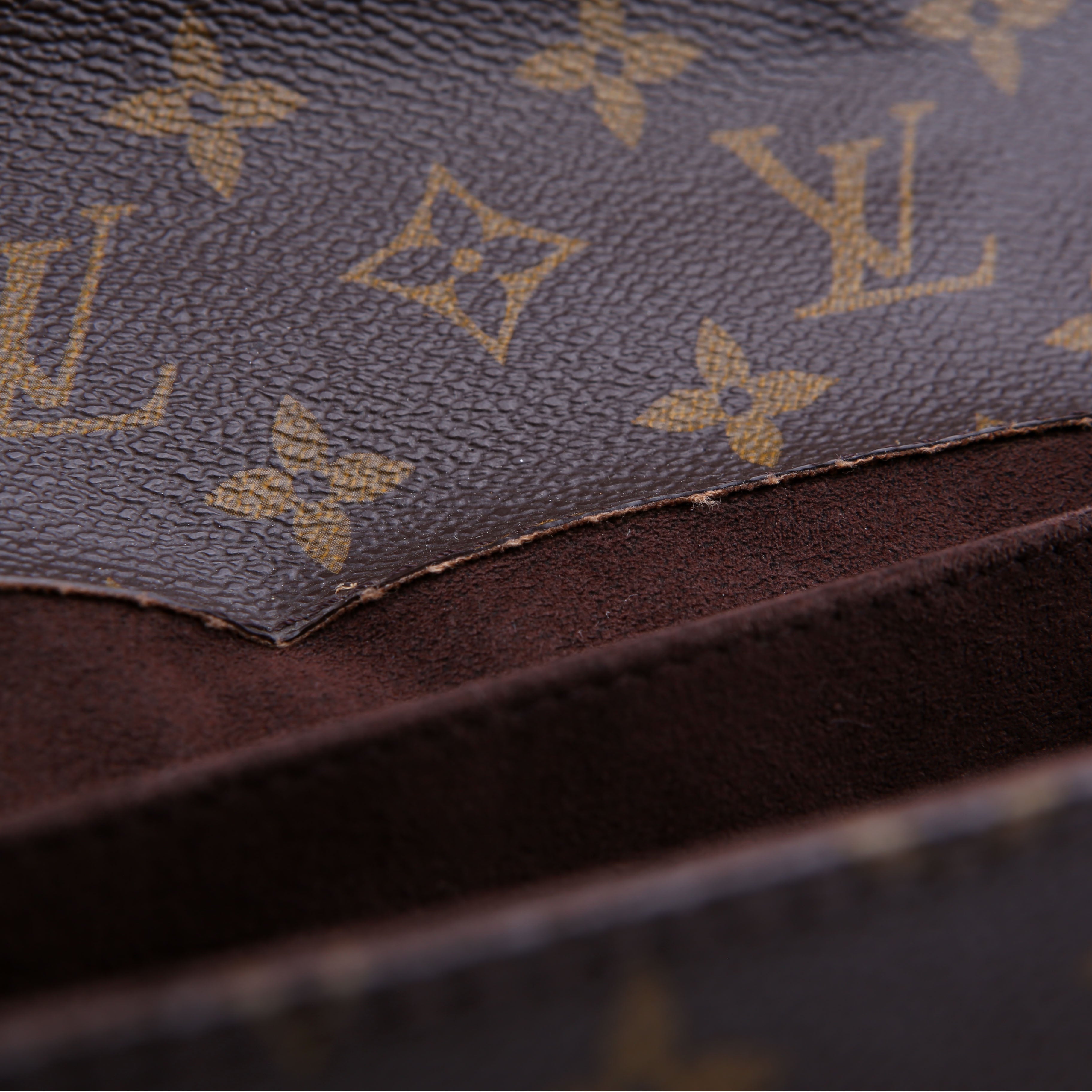 Pochette Metis Monogram