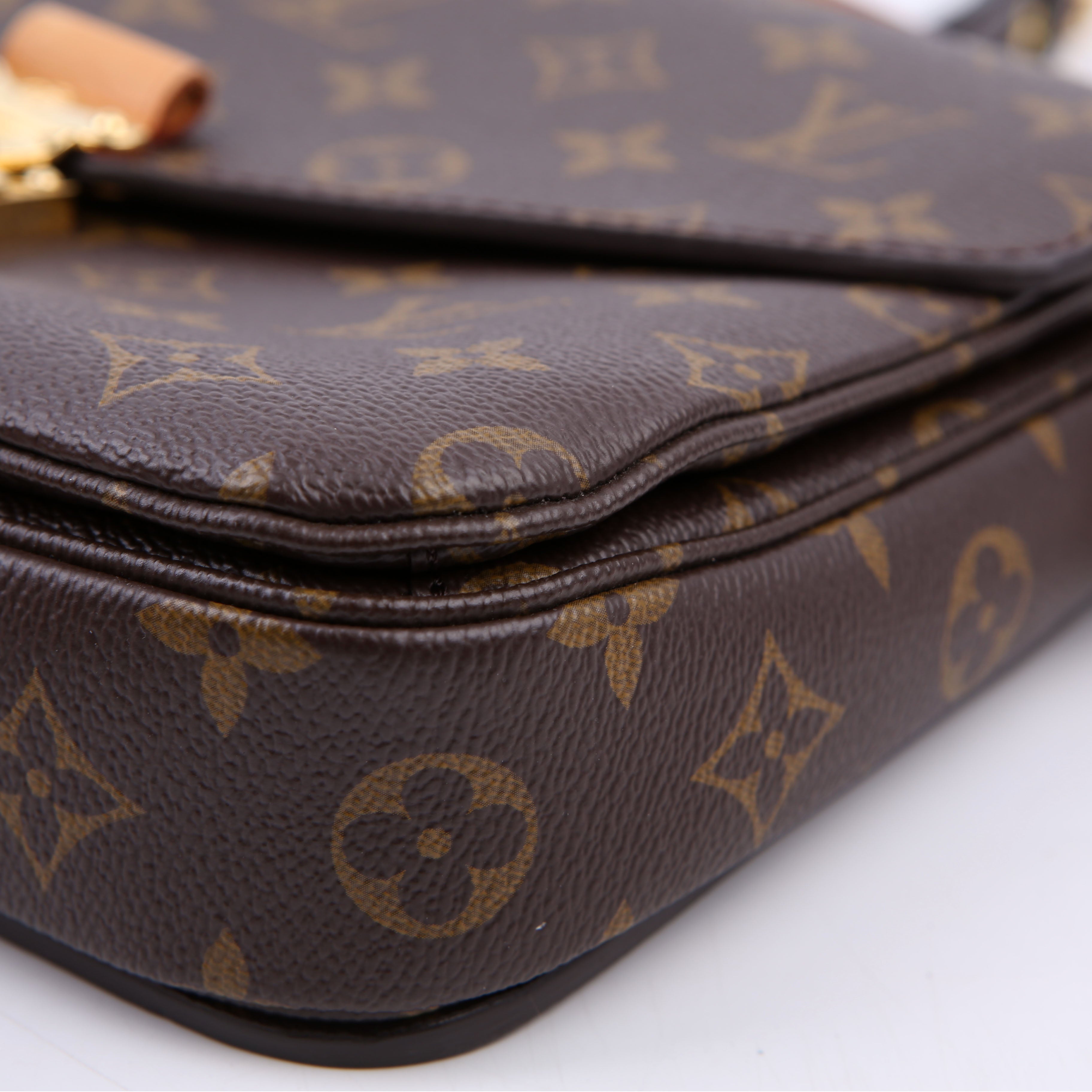 Pochette Metis Monogram