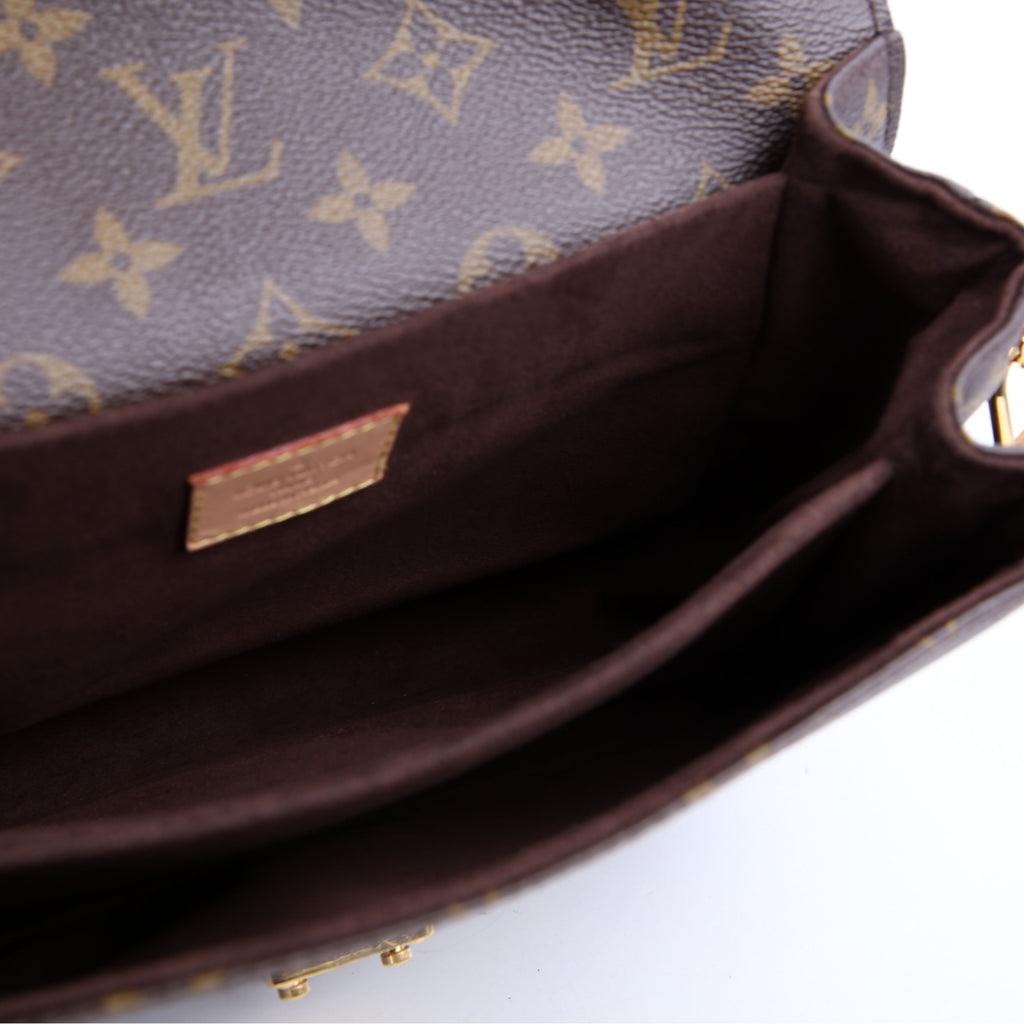 Pochette Metis Monogram