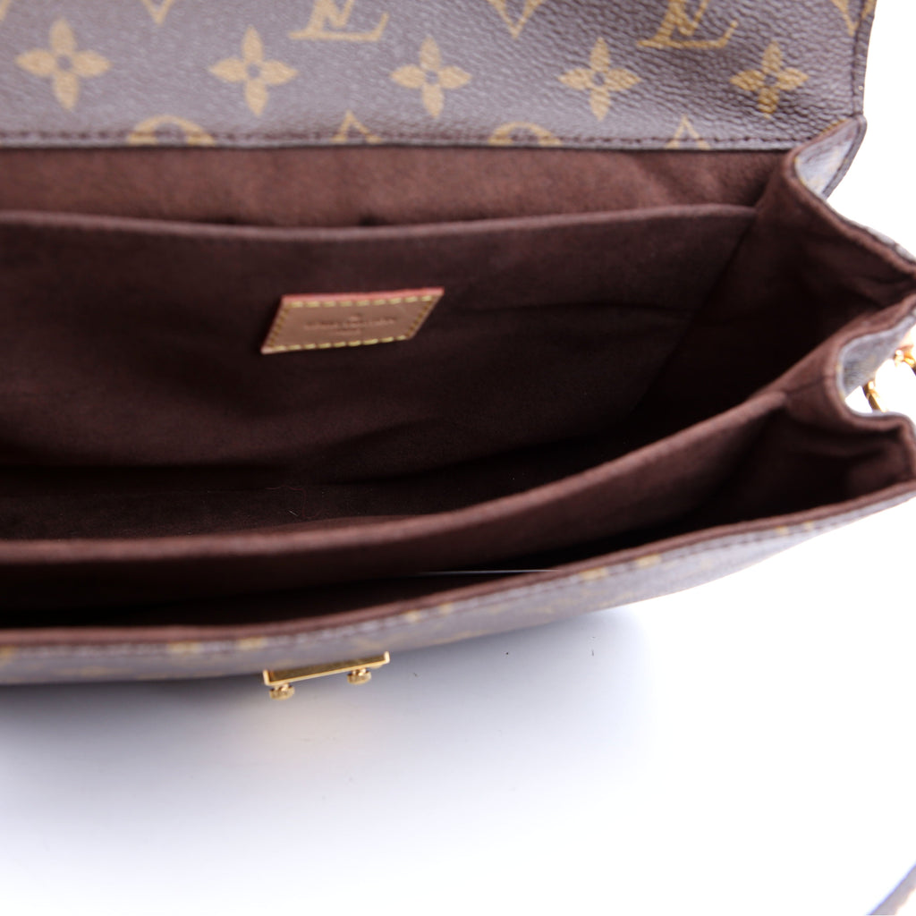Pochette Metis Monogram