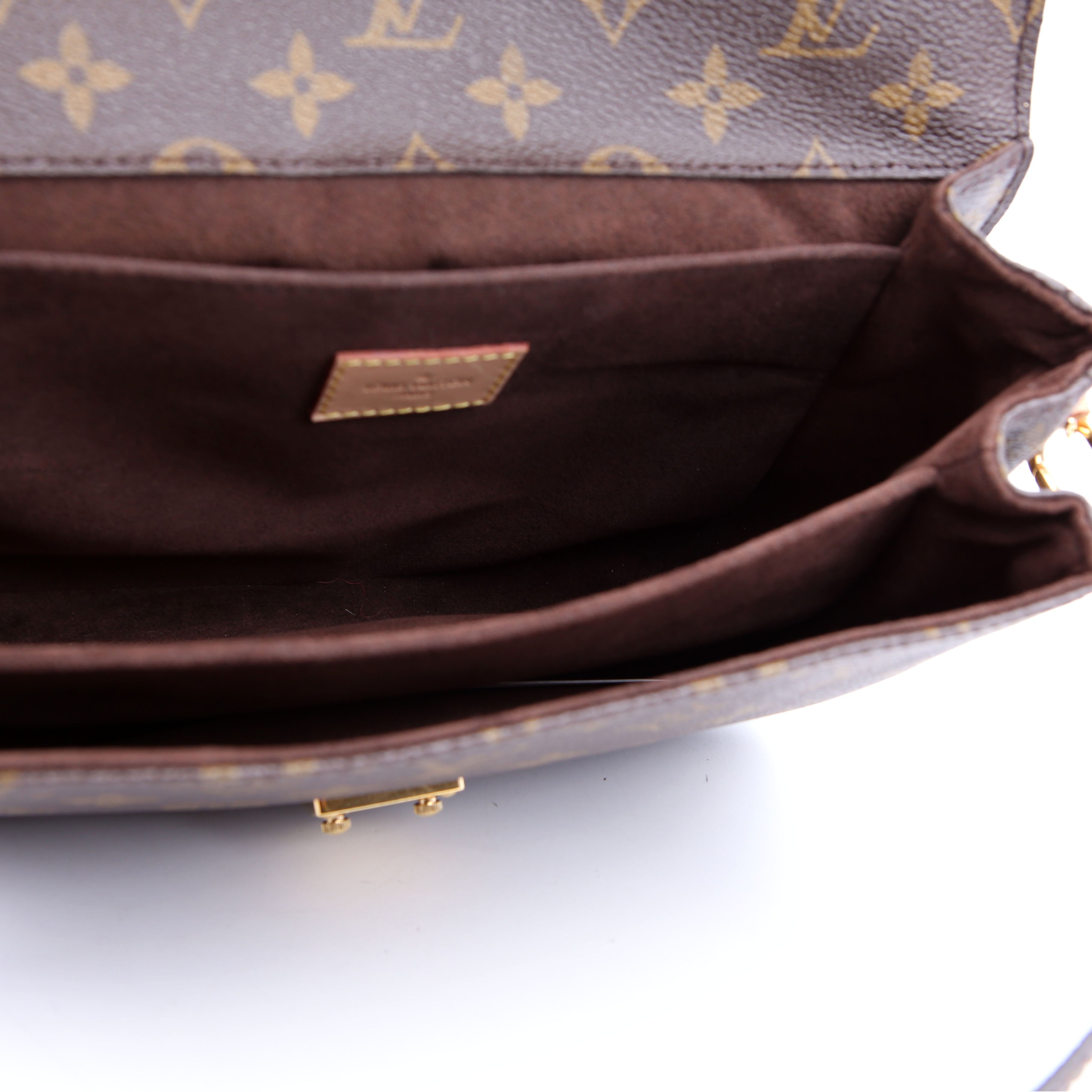 Pochette Metis Monogram